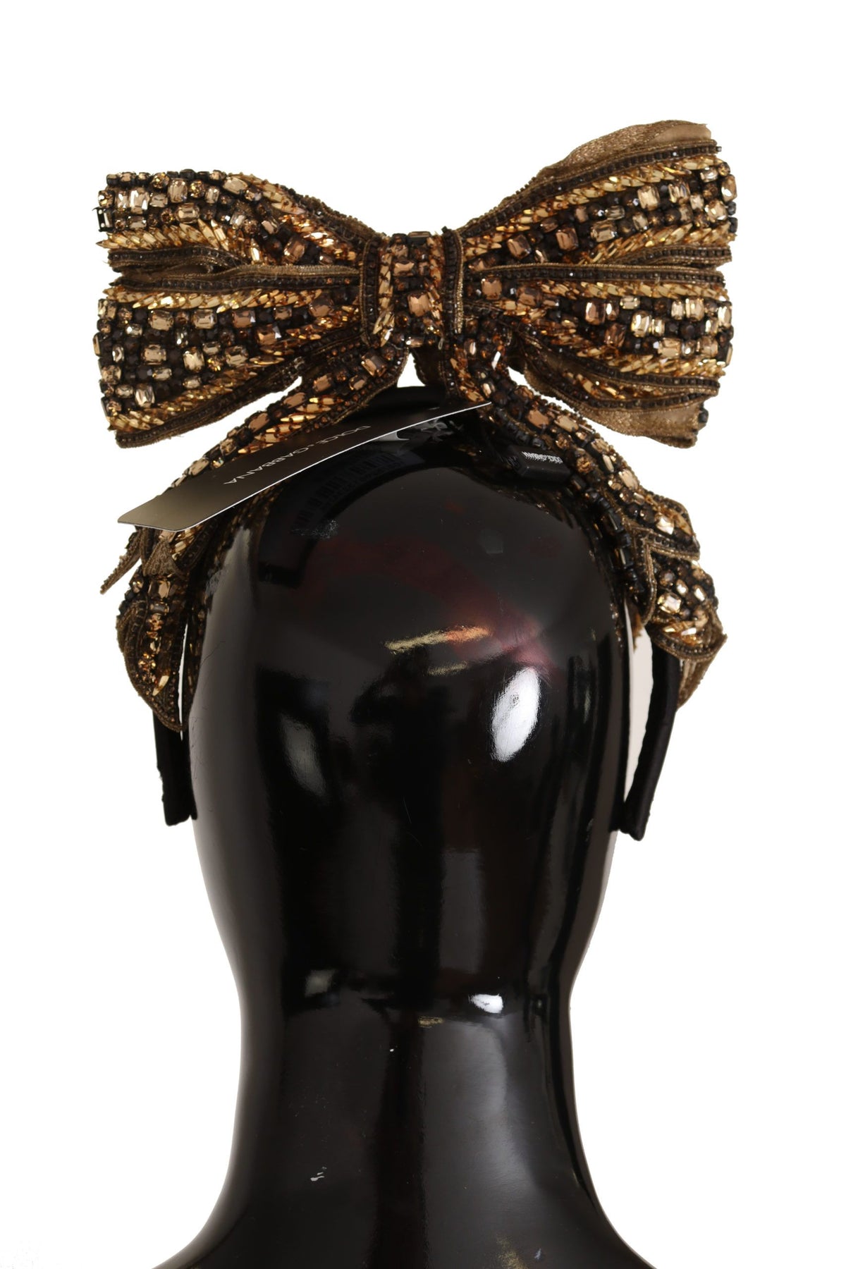 Indulge in the exquisite allure of the Dolce & Gabbana Gold Crystal Beaded Silk Bow Headband, a masterpiece of Italian craftsmanship that elevates your elegance for any occasion.