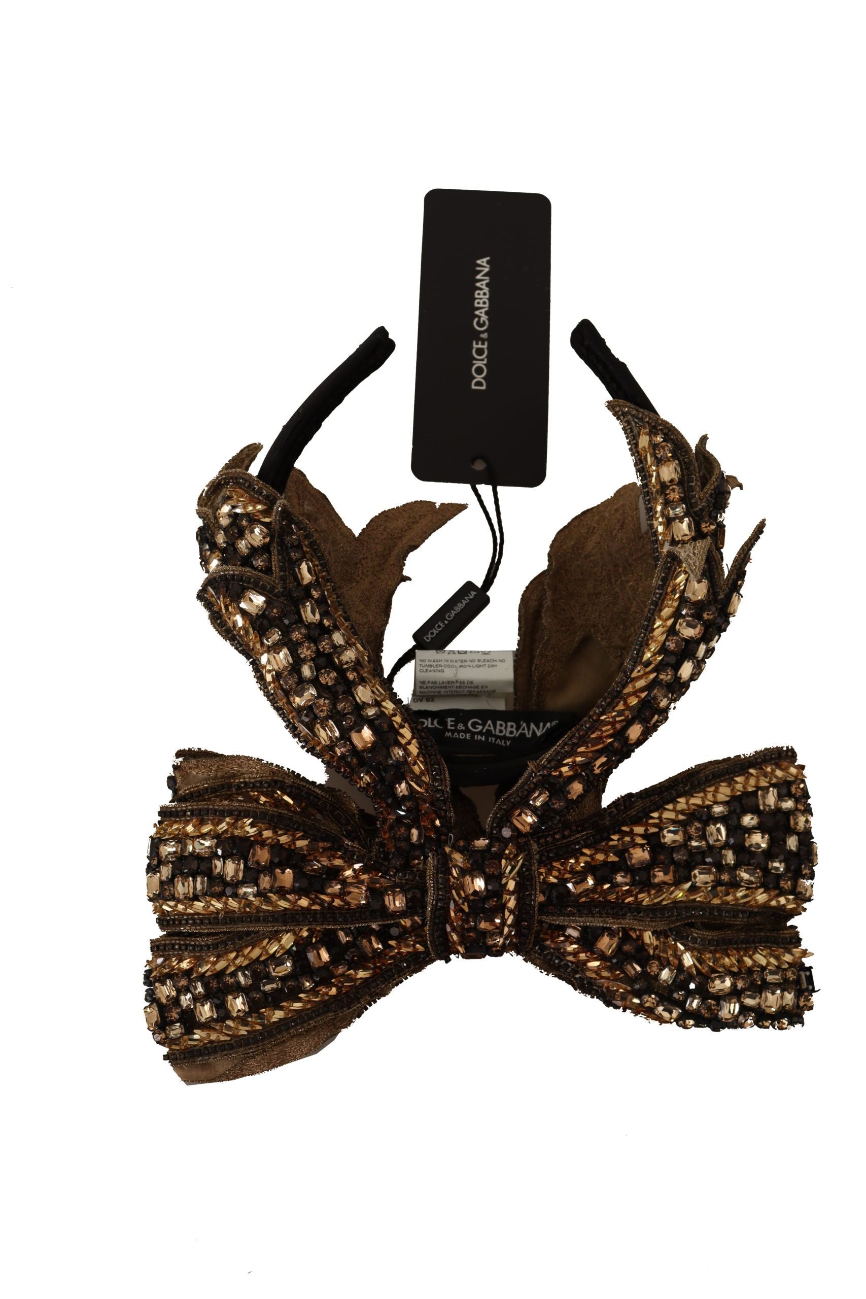 Indulge in the opulence of Dolce & Gabbana's Gold Crystal Beaded Silk Bow Headband, a handcrafted masterpiece that elevates your elegance with exquisite Italian artistry.