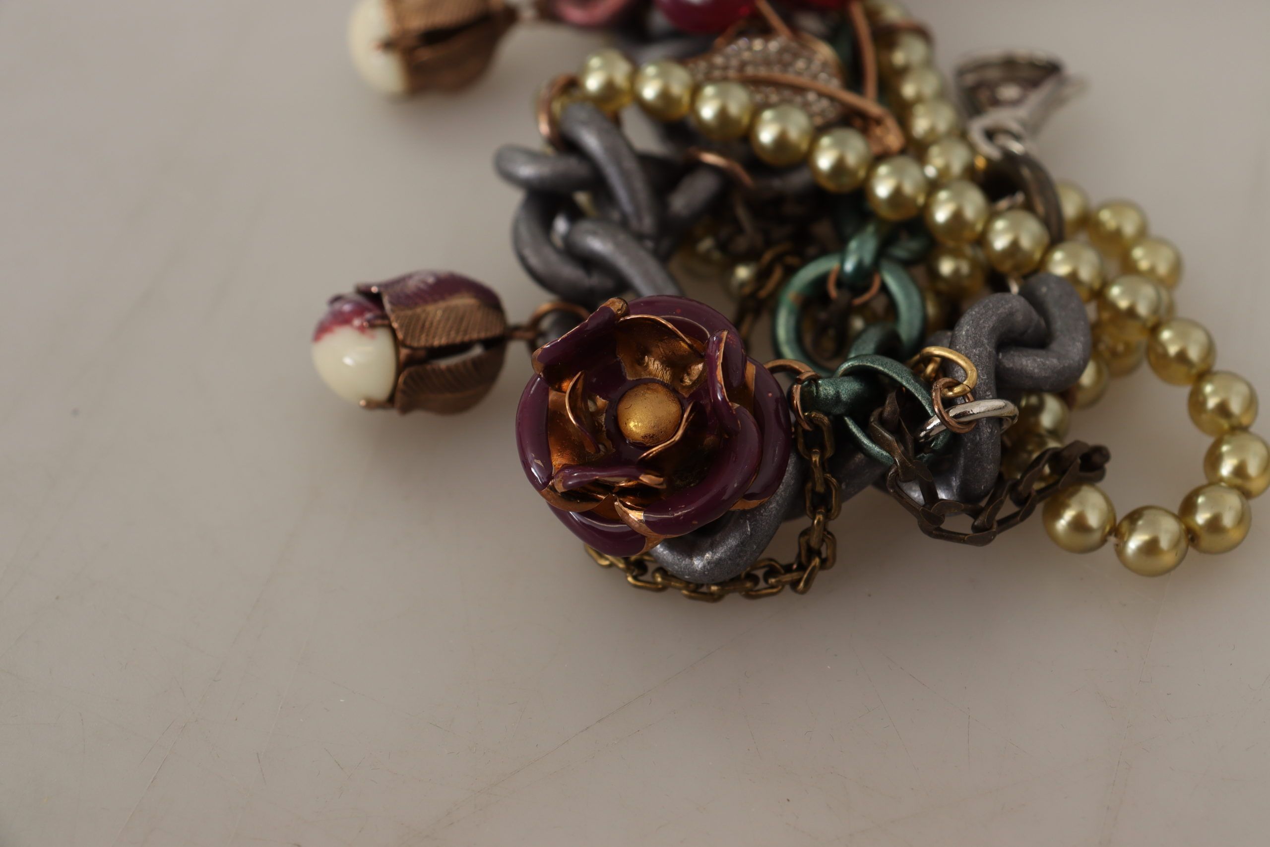 Indulge in the exquisite artistry of the Dolce & Gabbana Gold Brass Sicily Floral Crystal Statement Necklace, where vibrant crystals and luxurious gold brass redefine elegance.