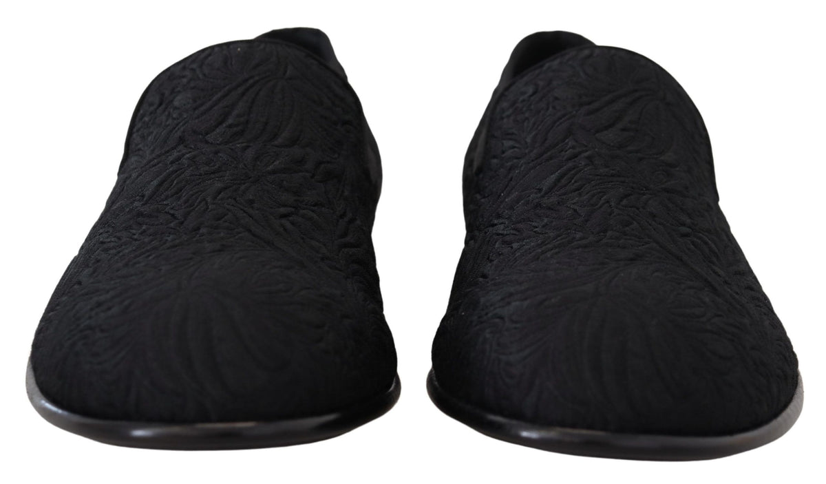 Experience the allure of Dolce & Gabbana Black Floral Jacquard Slippers, handcrafted in Italy from luxurious materials, embodying timeless elegance and sophistication.