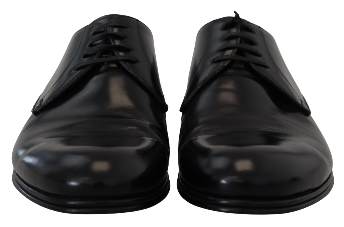 Discover the exquisite Dolce & Gabbana Black Leather Formal Dress Shoes, where artisanal craftsmanship meets timeless elegance, perfect for the discerning modern gentleman.