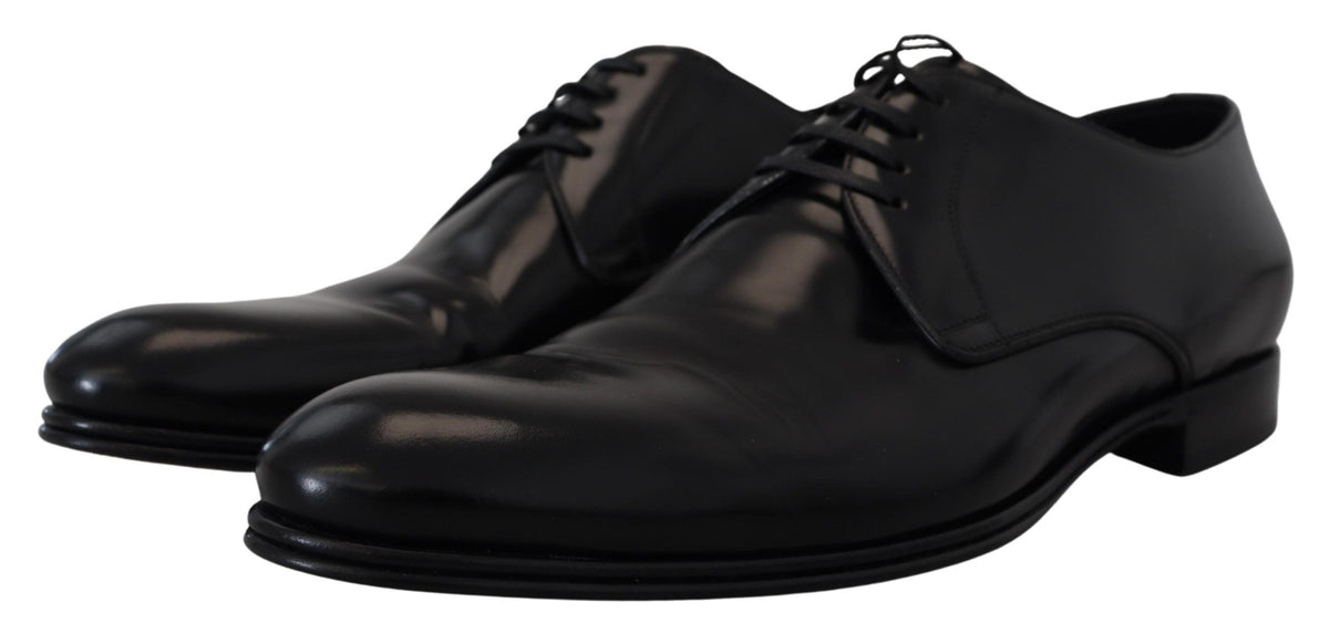 Indulge in the exquisite craftsmanship of Dolce & Gabbana's Black Leather Formal Dress Shoes, where timeless sophistication meets luxurious comfort for the modern connoisseur.