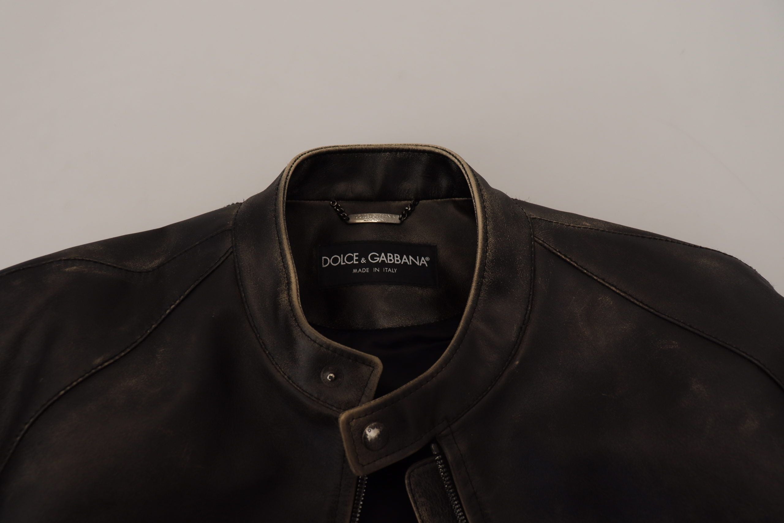 Indulge in the exquisite Dolce & Gabbana Black Leather Zipper Biker Coat Jacket, a symbol of Italian craftsmanship and luxury, perfect for the discerning fashion connoisseur.