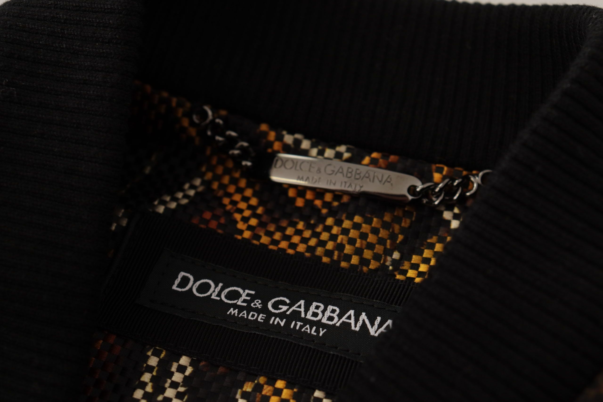 Experience the allure of the Dolce & Gabbana Brown Feather Full Zip Blouson Jacket, where exquisite craftsmanship and luxurious materials redefine timeless elegance.