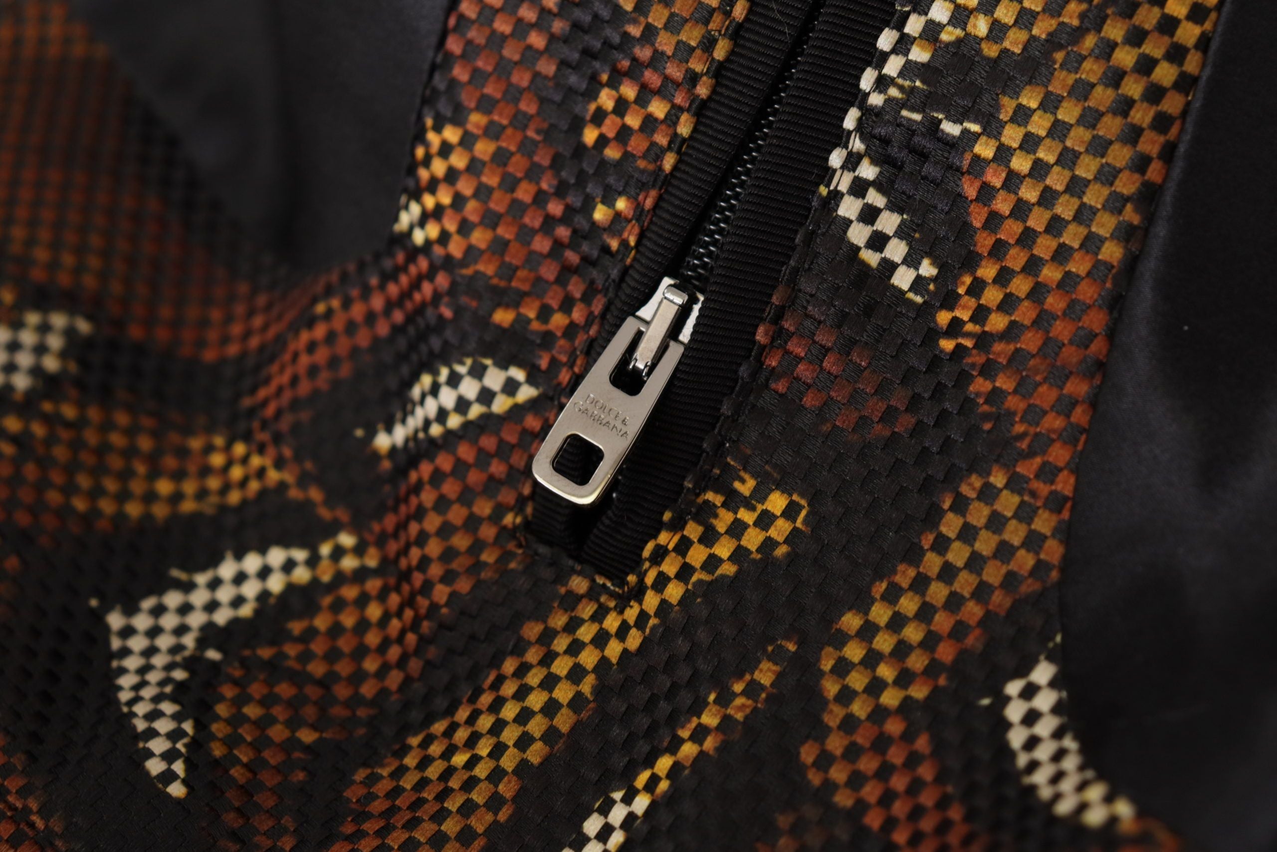 Elevate your style with the Dolce & Gabbana Brown Feather Full Zip Blouson Jacket, a masterpiece of Italian craftsmanship that embodies timeless luxury and sophistication.