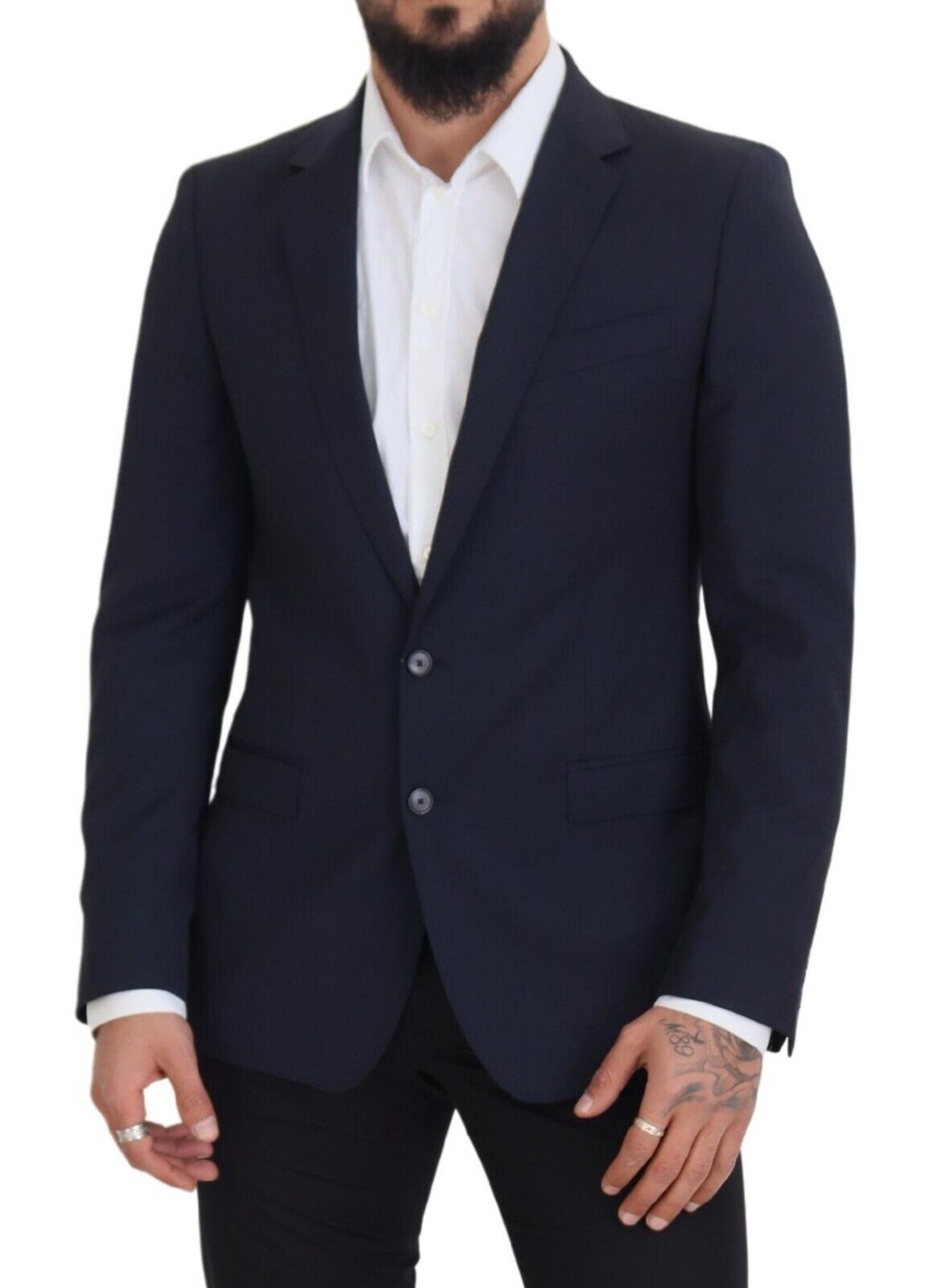 Elevate your wardrobe with the Dolce & Gabbana Dark Blue Wool MARTINI Blazer, a timeless piece of Italian craftsmanship that embodies luxury and sophistication.