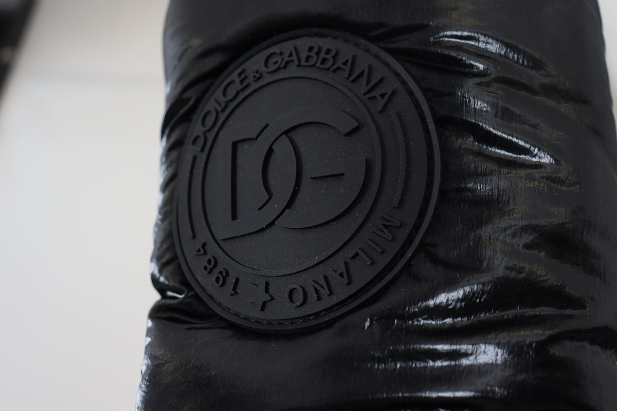 Elevate your winter wardrobe with Dolce & Gabbana Black Boots, crafted in Italy from luxurious polyester, merging exceptional craftsmanship with timeless sophistication.