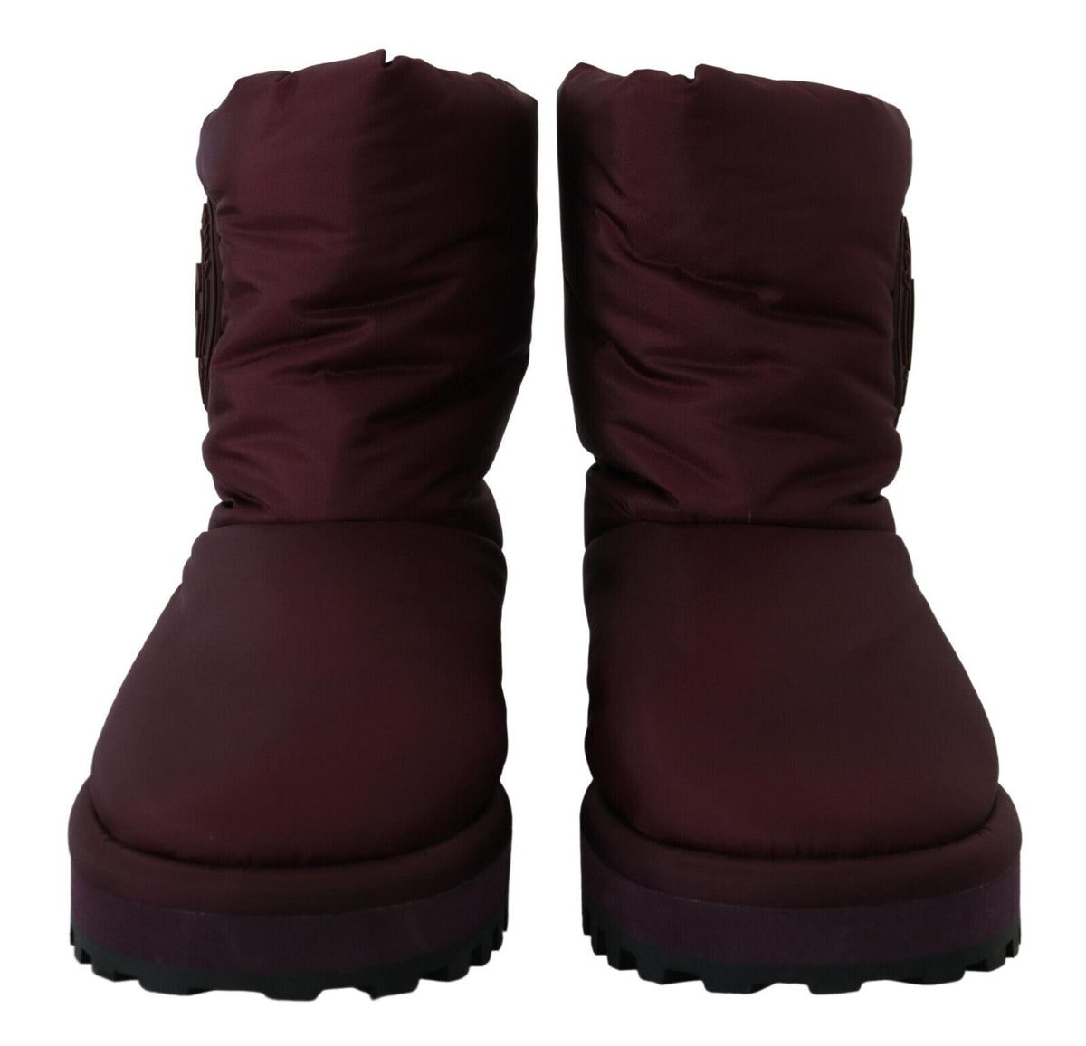 Step into sophistication with Dolce & Gabbana's Bordeaux Nylon Boots, where exquisite craftsmanship meets luxurious design, perfect for the discerning individual.