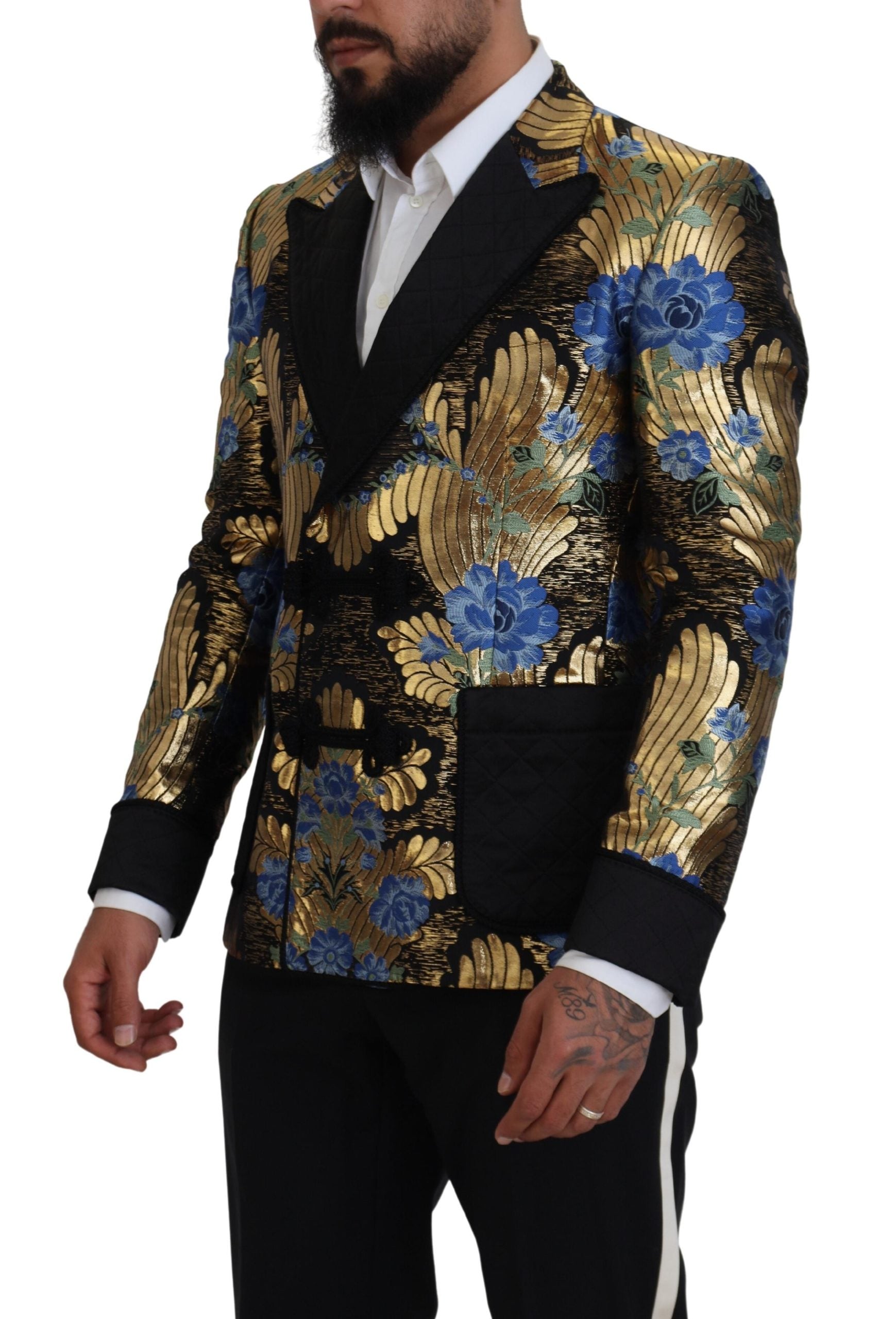 Indulge in the Dolce & Gabbana Gold Lurex Double Breasted Jacket Blazer, a masterpiece of Italian craftsmanship, blending luxurious fabrics with timeless elegance for the discerning connoisseur.