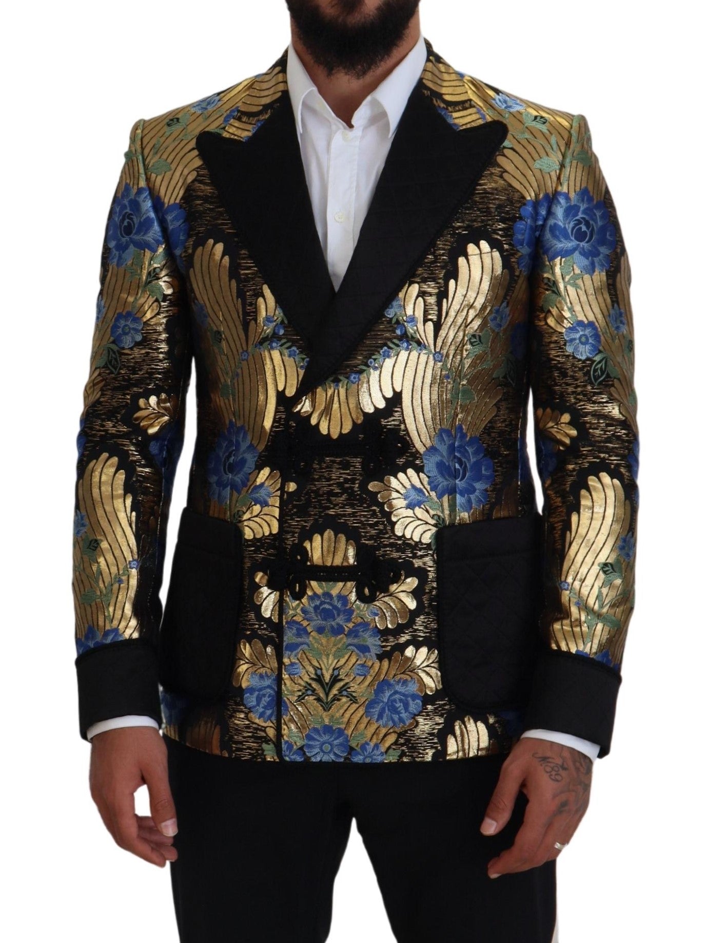 Indulge in the Dolce & Gabbana Gold Lurex Double Breasted Jacket Blazer, a masterpiece of Italian craftsmanship that redefines luxury with its exquisite floral patterns and tailored elegance.