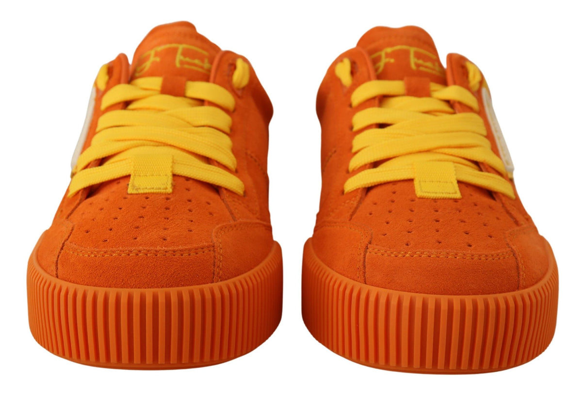 Step into luxury with Dolce & Gabbana's Orange Leather P.J. Tucker Sneakers, where exquisite Italian craftsmanship meets bold style for the discerning individual.