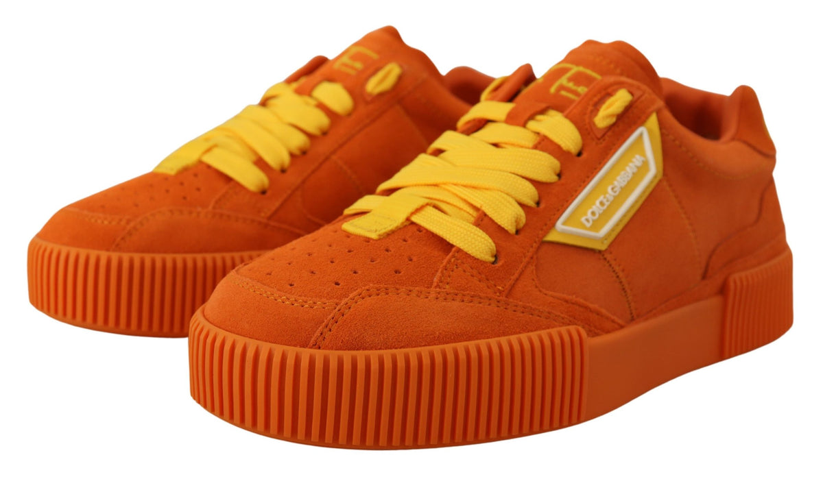 Discover the allure of Dolce & Gabbana's Orange Leather P.J. Tucker Sneakers, where exquisite Italian craftsmanship meets bold elegance for the discerning individual.