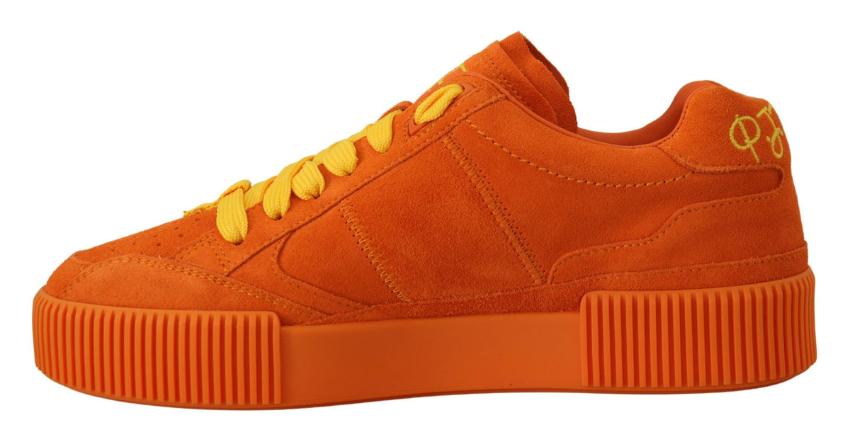 Indulge in the exquisite Dolce & Gabbana Orange Leather P.J. Tucker Sneakers, where luxurious Italian craftsmanship meets vibrant style, perfect for the confident individual.