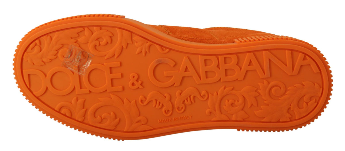 Indulge in the exquisite Dolce & Gabbana Orange Leather P.J. Tucker Sneakers, where Italian craftsmanship meets bold elegance, elevating your style with every step.