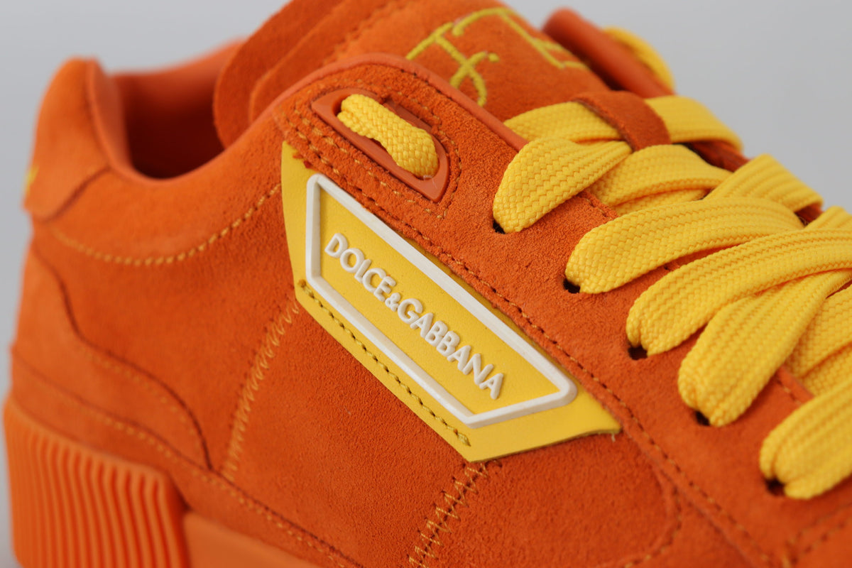 Indulge in the luxurious allure of Dolce & Gabbana's Orange Leather P.J. Tucker Sneakers, where exquisite Italian craftsmanship meets bold style for the confident individual.