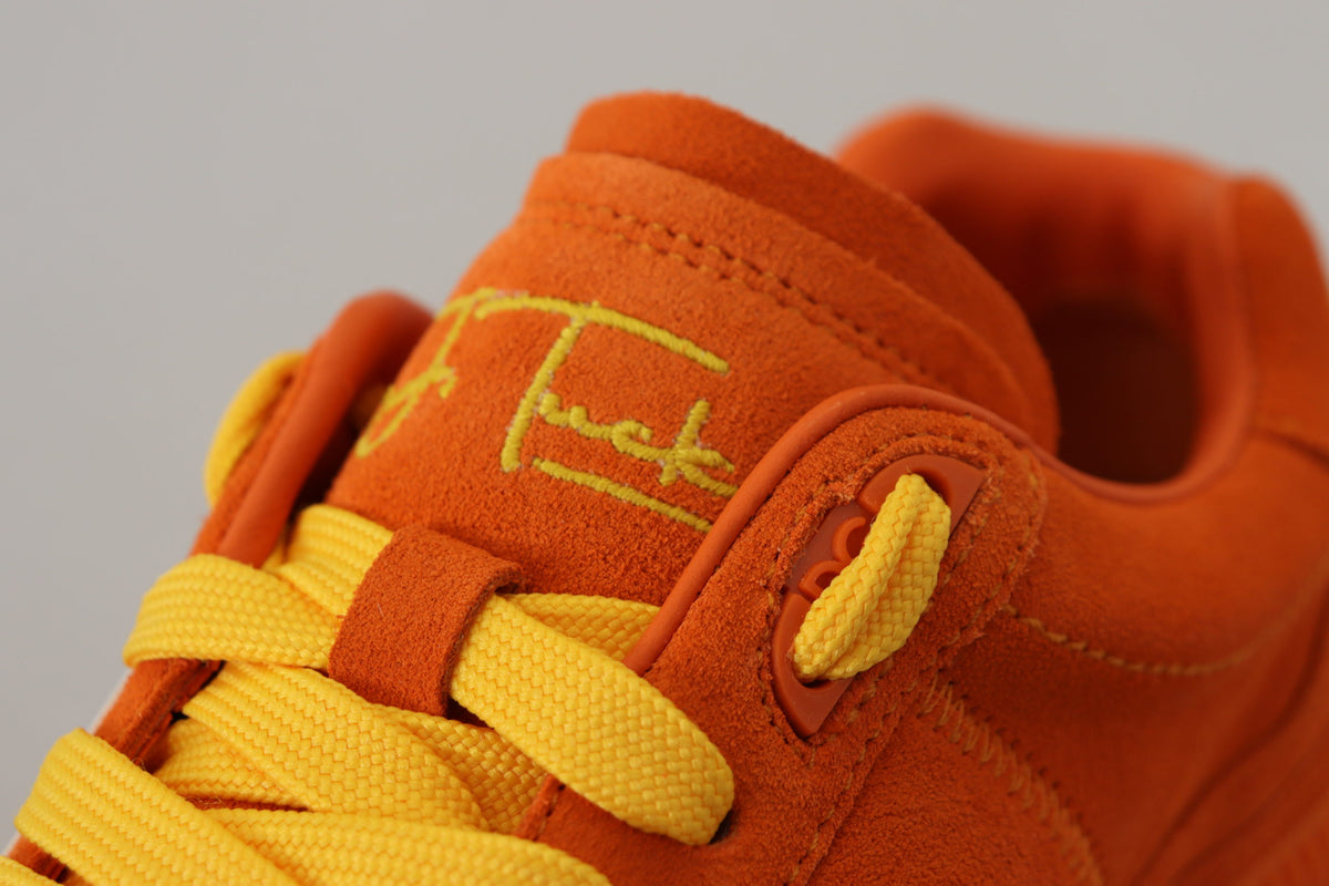 Elevate your style with Dolce & Gabbana's Orange Leather P.J. Tucker Sneakers, where exquisite Italian craftsmanship meets bold elegance for the discerning individual.
