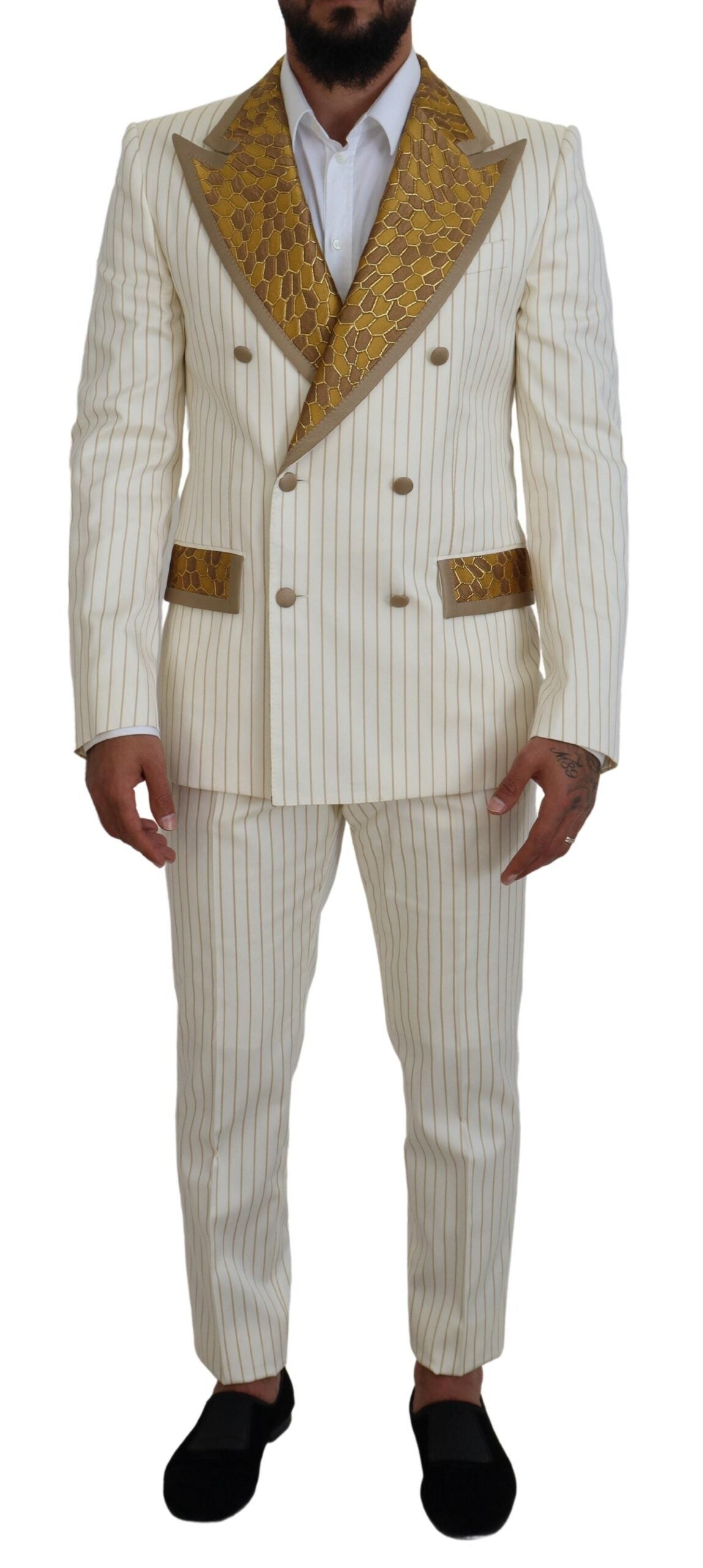 Elevate your elegance with the Dolce & Gabbana Off White Gold Striped Tuxedo Slim Fit Suit, a masterpiece of Italian craftsmanship designed for the discerning individual.