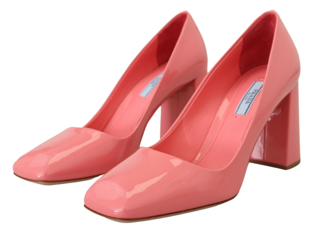 Indulge in the exquisite Prada Pink Patent Leather Block Heels, a timeless embodiment of Italian craftsmanship and elegance, perfect for the sophisticated modern individual.