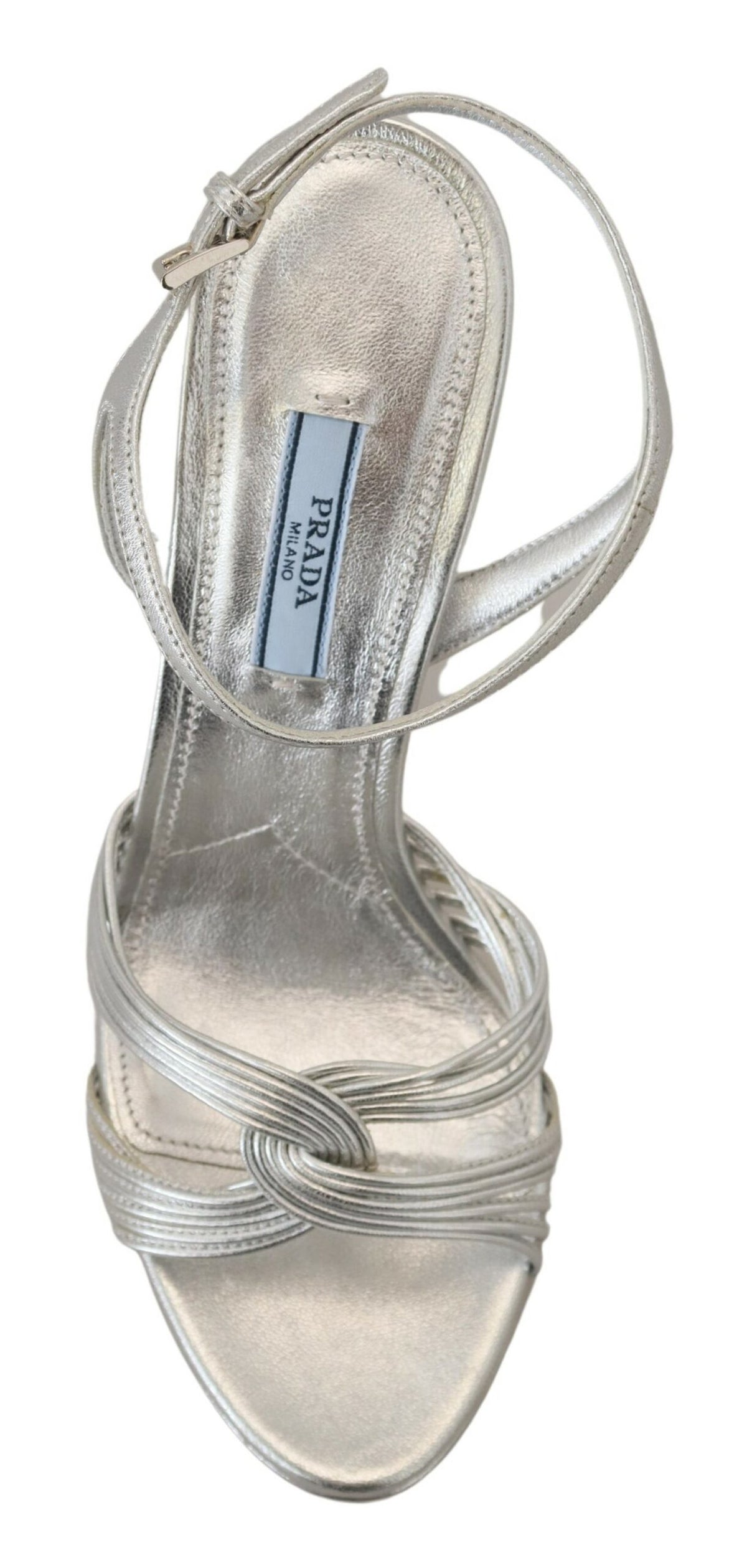 Step into a world of refined elegance with Prada's Silver Leather Sandals, expertly crafted in Italy from premium leather, embodying timeless luxury and sophisticated allure.