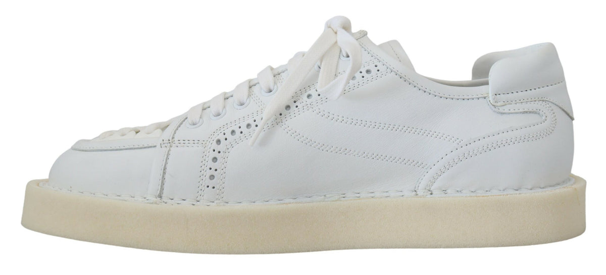 Elevate your style with Dolce & Gabbana's White Leather Low Top Oxford Sneakers, crafted in Italy from premium leather, embodying timeless elegance and unmatched comfort.