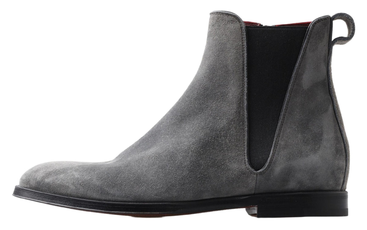 Step into sophistication with Dolce & Gabbana Gray Leather Ankle Boots, handcrafted in Italy from genuine leather, embodying timeless elegance and luxurious artistry.