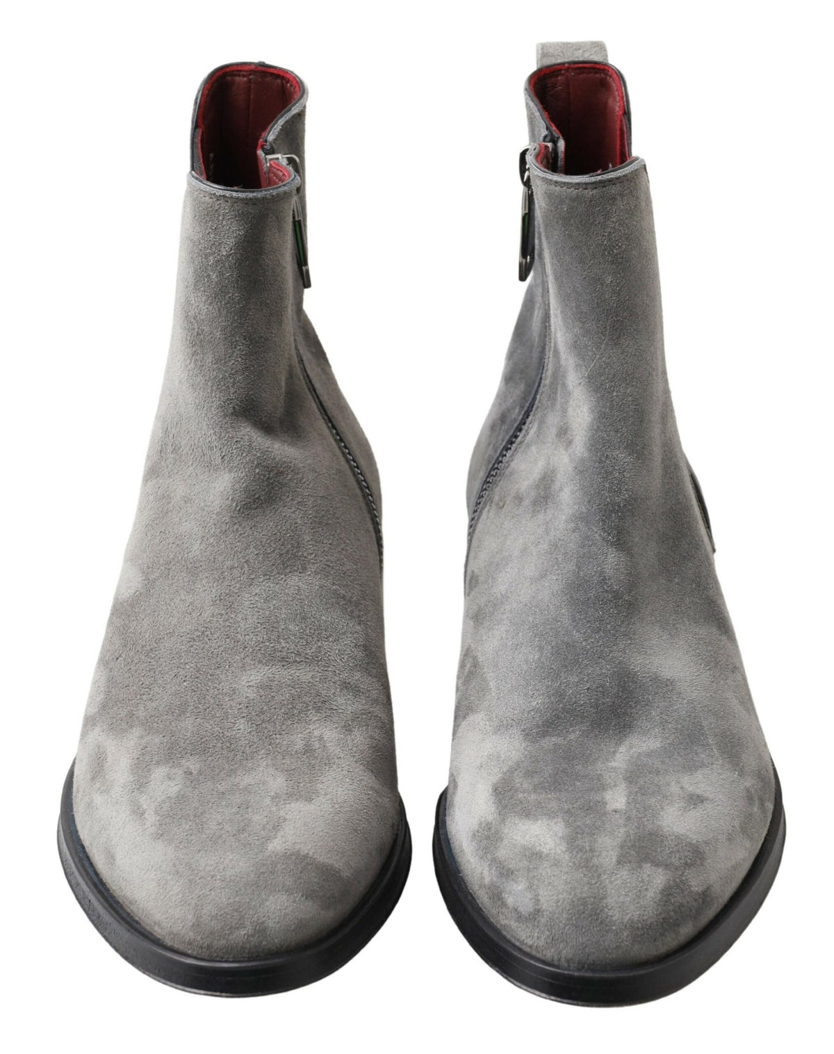 Step into timeless elegance with Dolce & Gabbana Gray Leather Ankle Boots, handcrafted in Italy from luxurious leather, embodying sophistication and refined style for the discerning individual.
