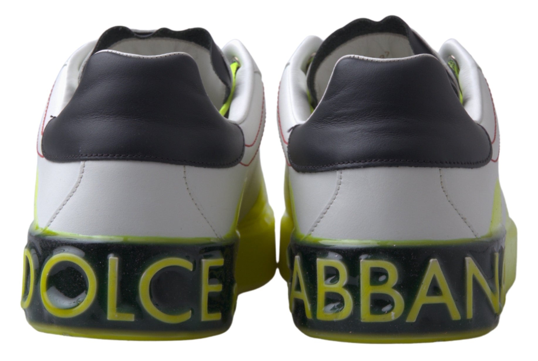 Indulge in the exquisite Dolce & Gabbana White Yellow Portofino Leather Sneakers, where premium leather meets Italian craftsmanship, elevating your style with luxurious sophistication.