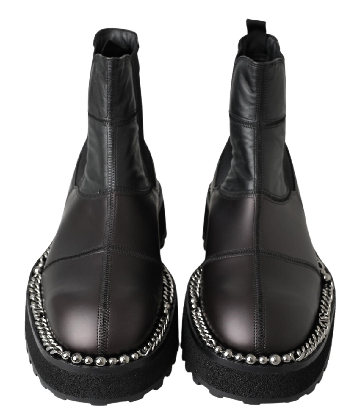 Indulge in the exquisite Dolce & Gabbana Black Leather Slip on Stretch Boots, a masterpiece of Italian craftsmanship, blending luxury and elegance for the discerning individual.