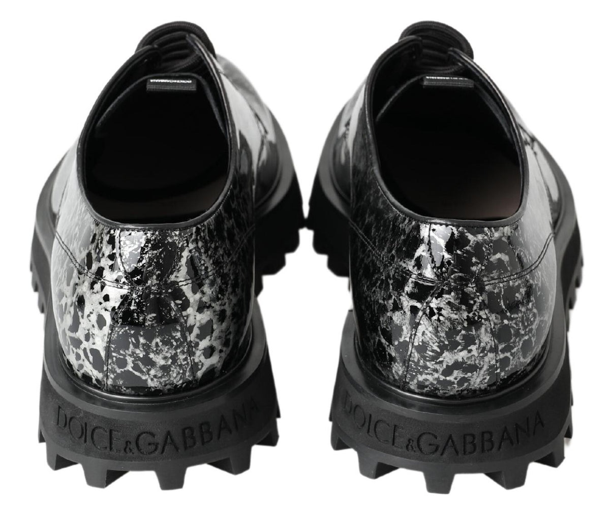 Step into unparalleled elegance with Dolce & Gabbana's Black White Derby Patent Leather Shoes, crafted in Italy from premium materials for the discerning connoisseur.