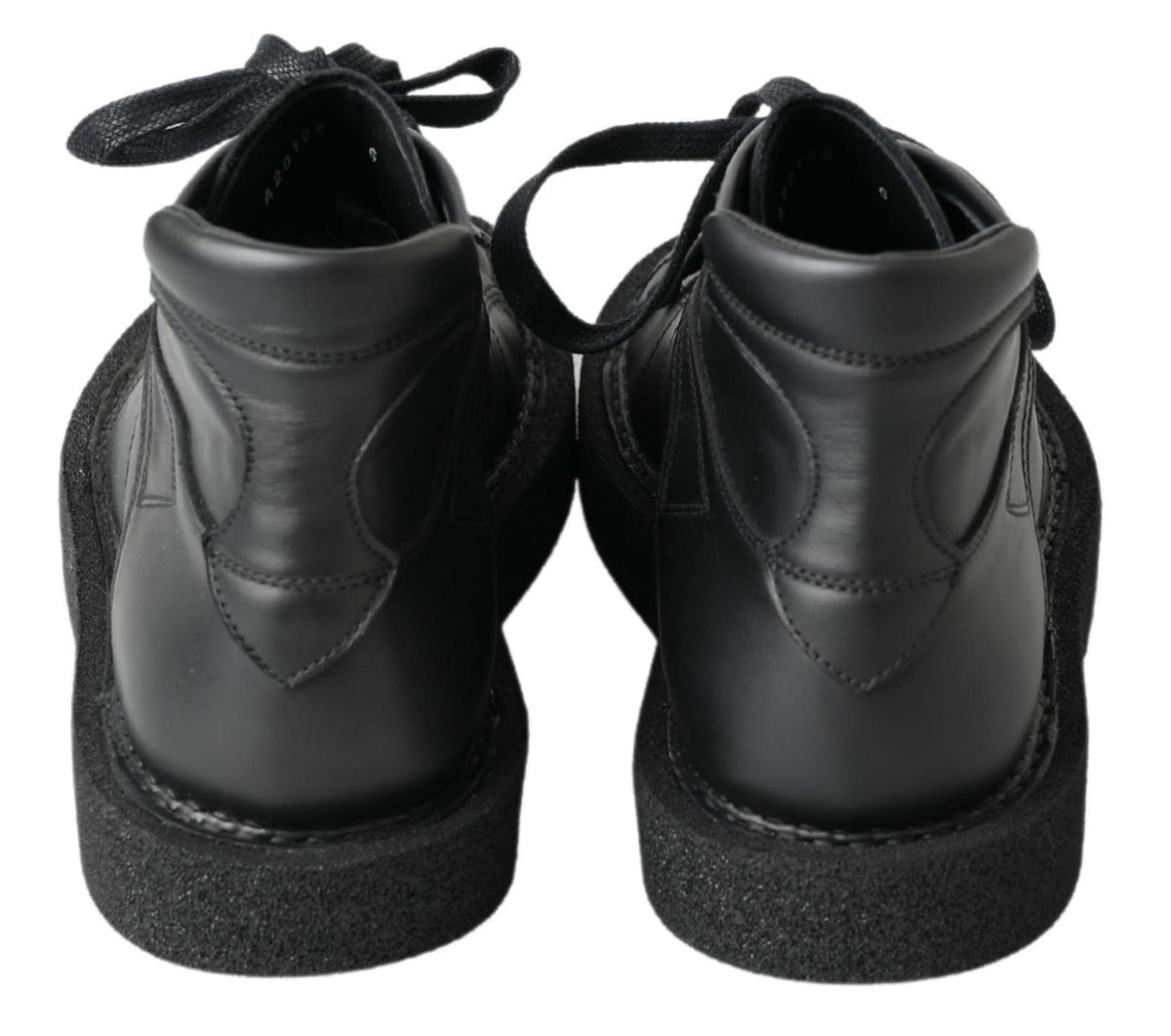 Discover the exquisite Dolce & Gabbana Black Leather Slip-on Stretch Boots, where Italian craftsmanship meets effortless elegance, elevating your style with luxurious sophistication.