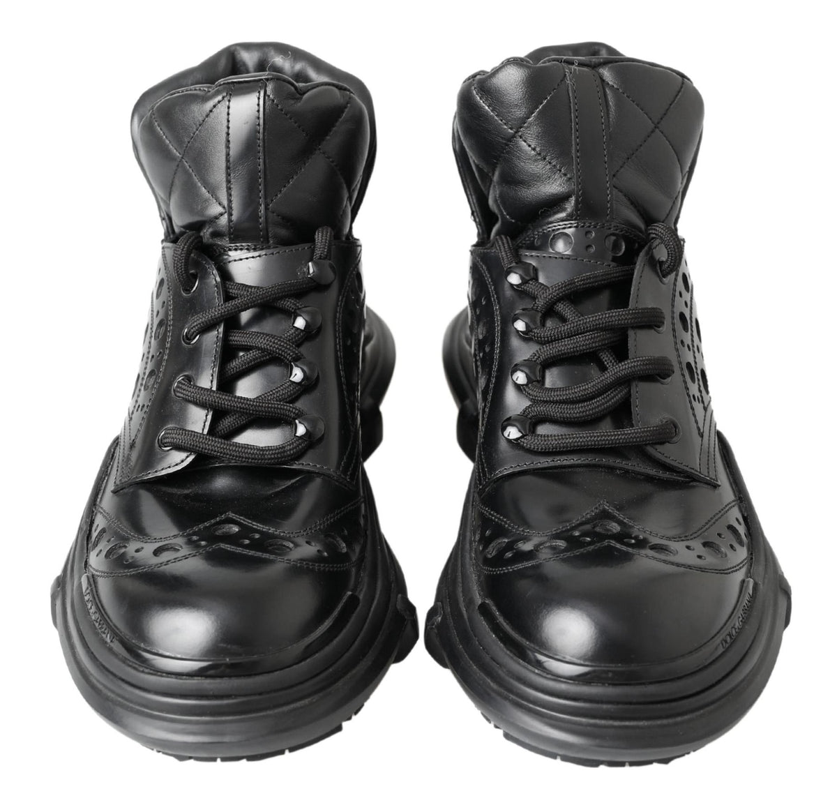Indulge in the exquisite Dolce & Gabbana Black Leather Ankle Casual Boots, where artisanal craftsmanship meets timeless elegance, perfect for the discerning individual.