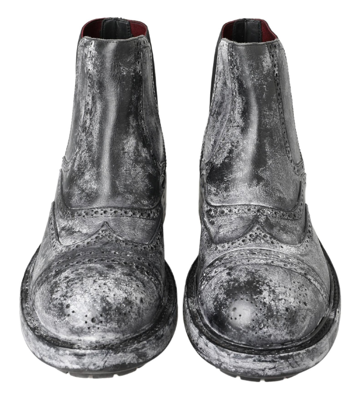 Elevate your style with Dolce & Gabbana Black Gray Leather Ankle Boots, a blend of exquisite craftsmanship and luxurious materials, perfect for the discerning individual.