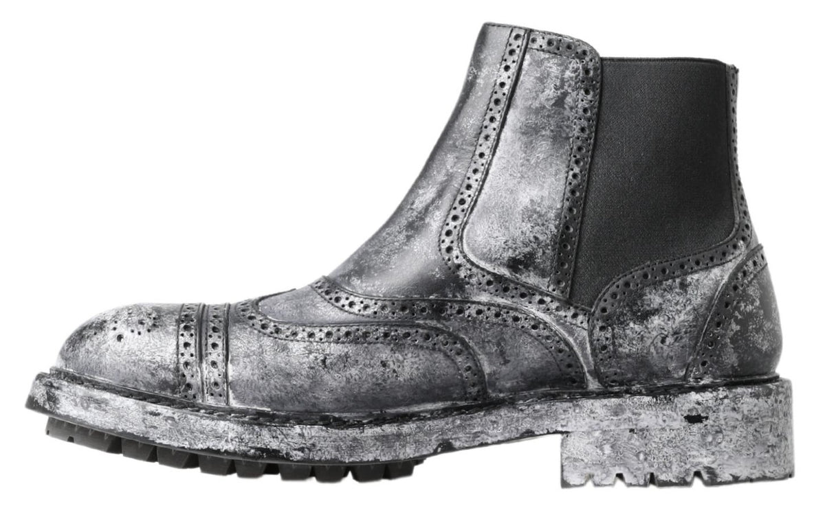 Elevate your style with Dolce & Gabbana Black Gray Leather Ankle Boots, a luxurious blend of Italian craftsmanship and modern design, perfect for the discerning individual.