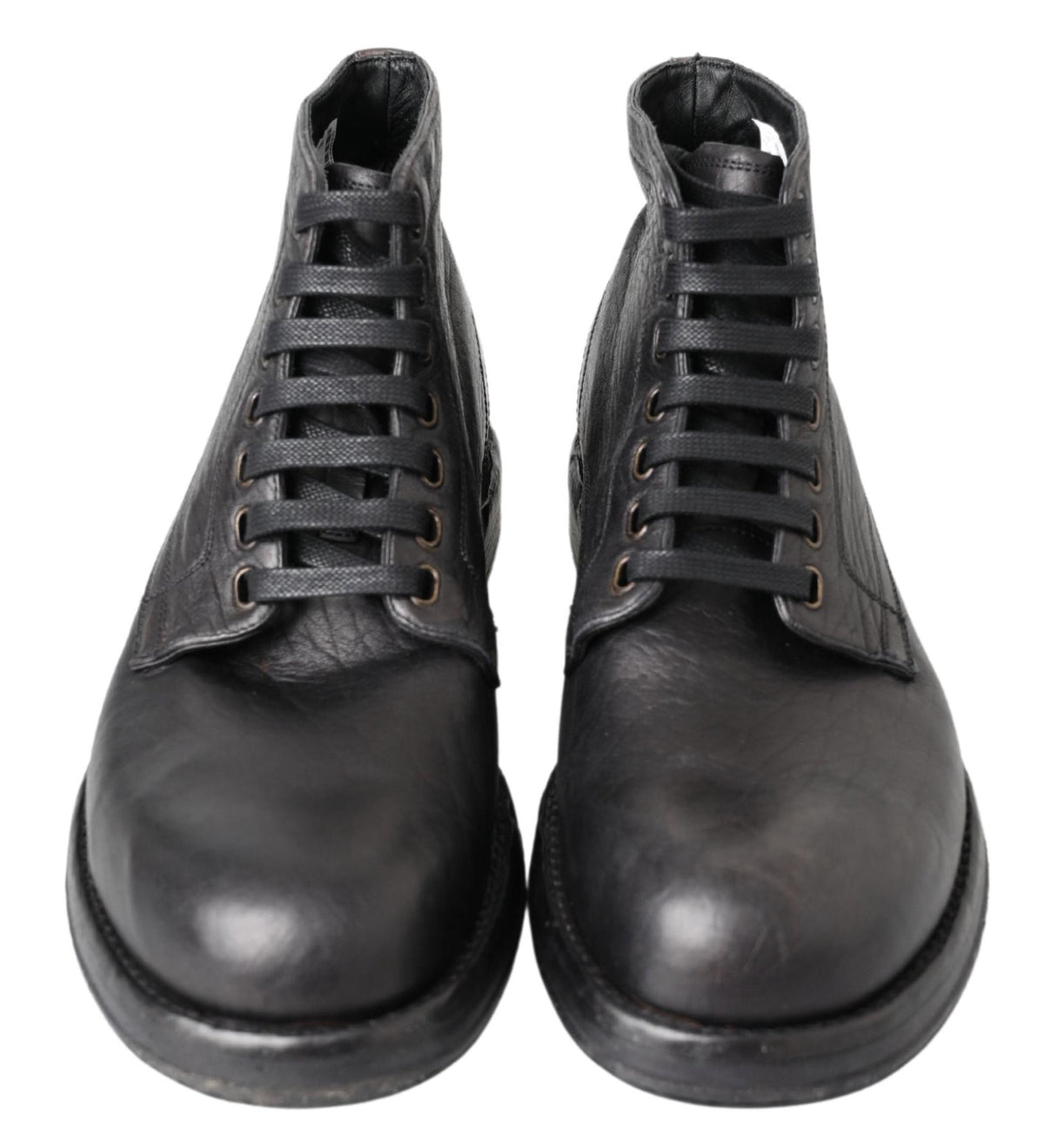 Indulge in the Dolce & Gabbana Black Horse Leather Perugino Boots, where exquisite Italian craftsmanship meets timeless elegance, elevating your style with luxury and sophistication.