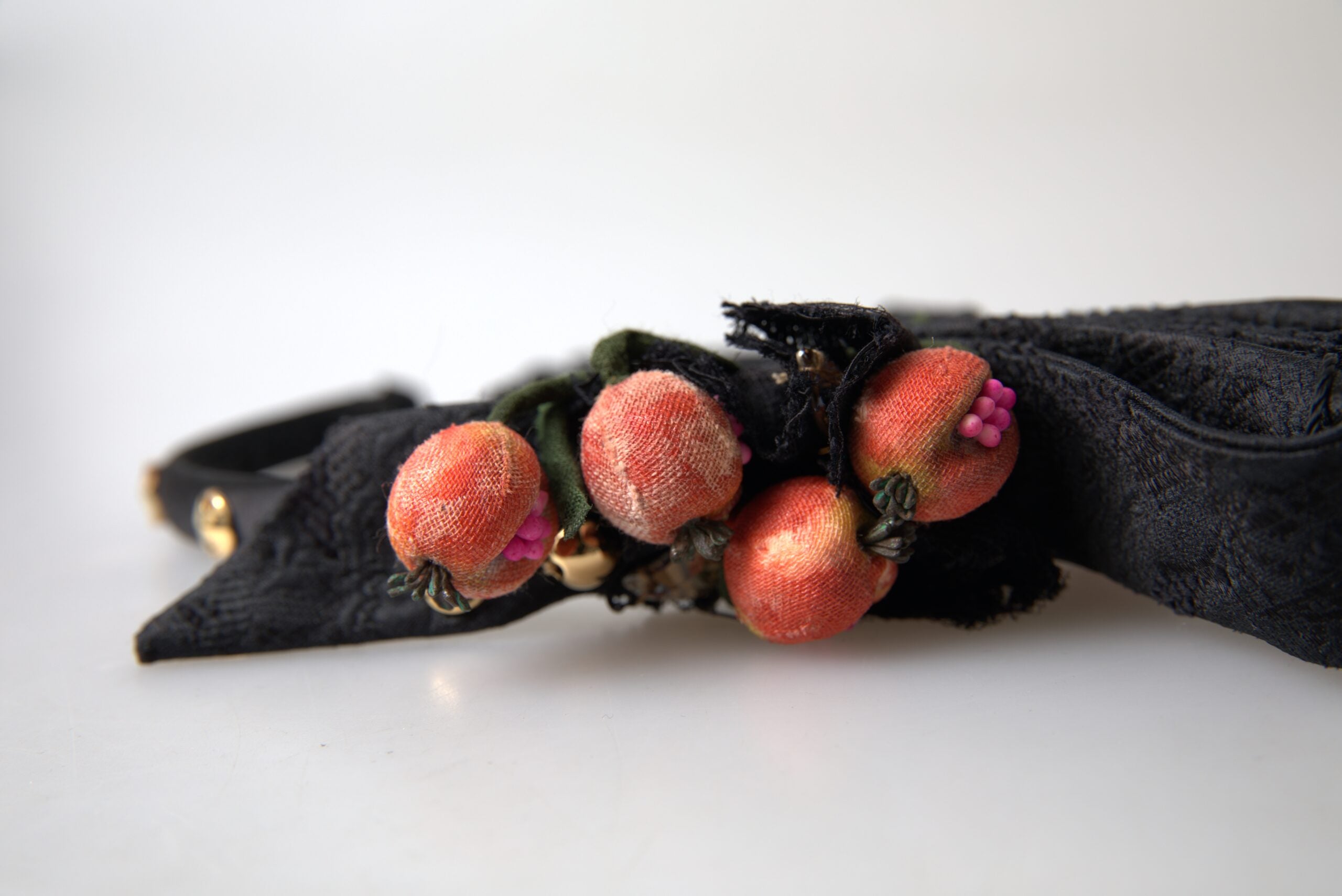 Elevate your elegance with the Dolce & Gabbana Black with Multicolor Fig Fruit Crystal Tiara Diadem Headband, a masterpiece of Italian craftsmanship that embodies opulence and allure.