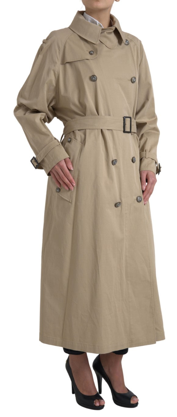 Discover the Dolce & Gabbana Khaki Double Breasted Trench Coat, a symbol of Italian craftsmanship and timeless elegance, perfect for elevating any sophisticated wardrobe.