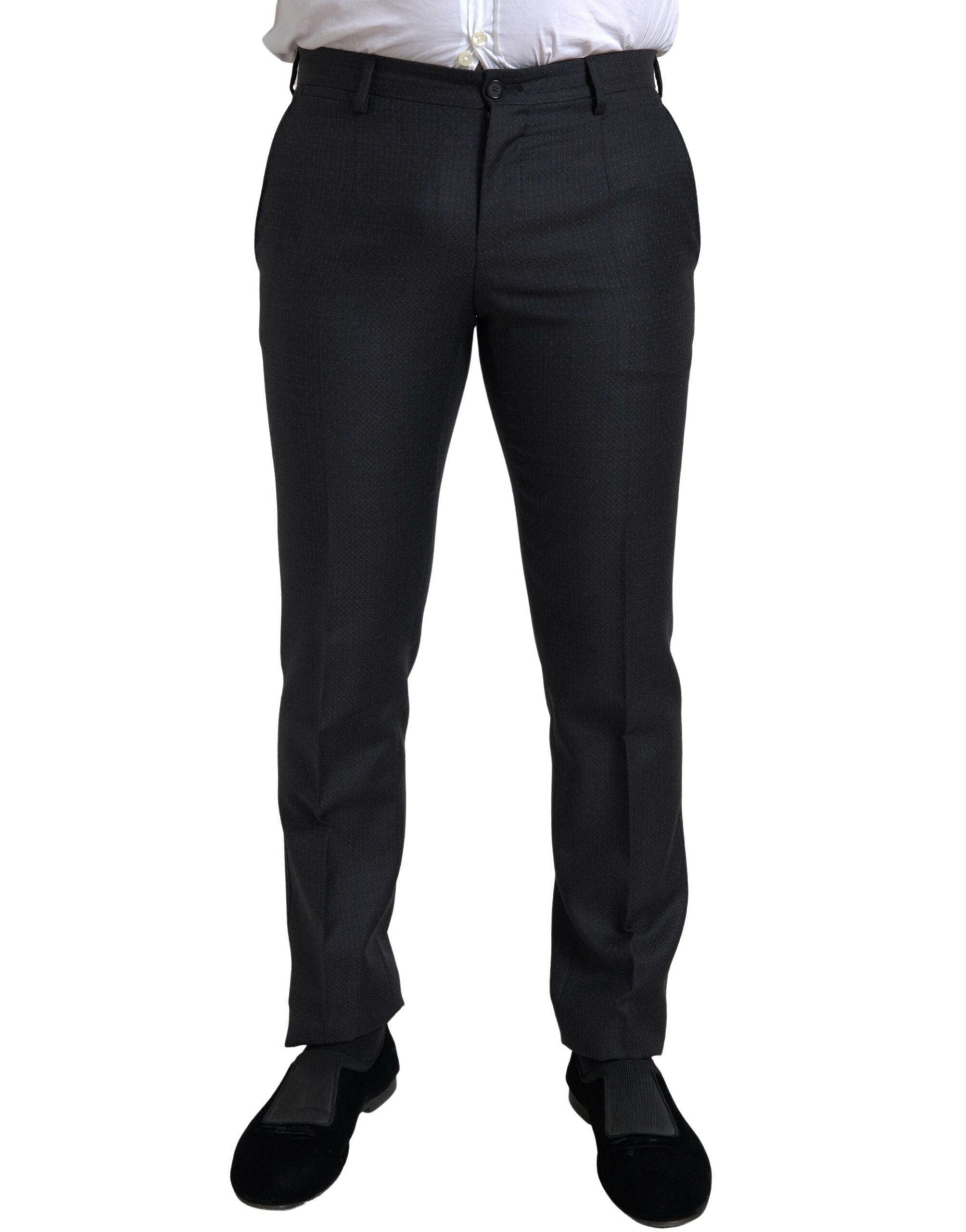 Experience the allure of the Dolce & Gabbana Black MARTINI Suit, crafted from luxurious virgin wool, embodying exquisite craftsmanship and timeless elegance for the discerning individual.