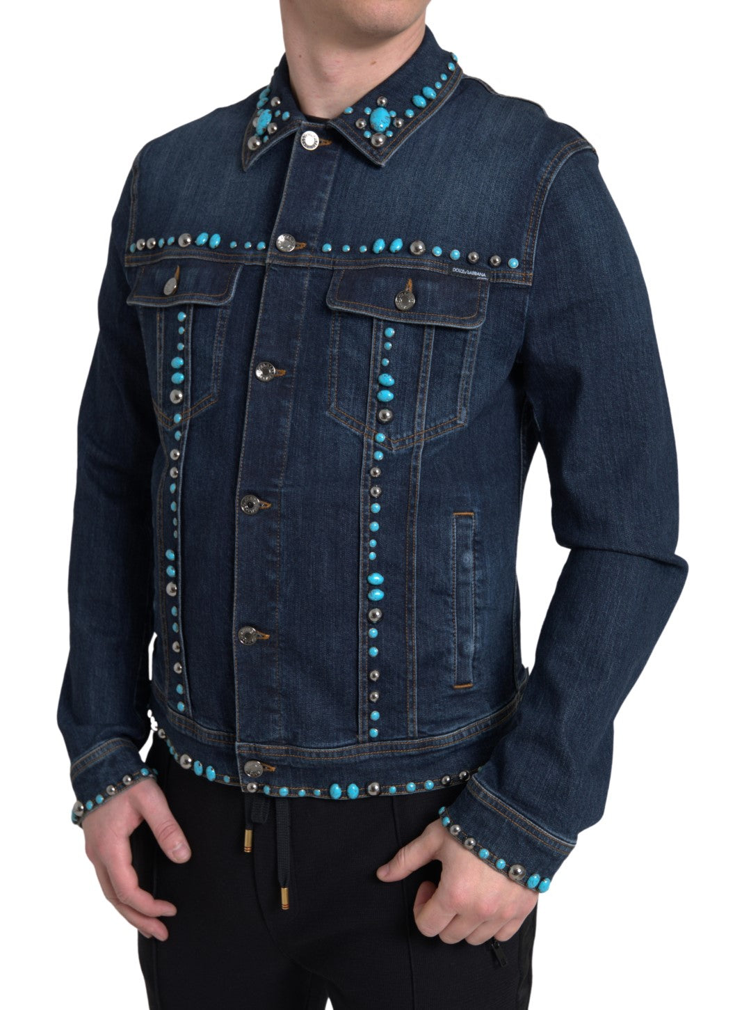 Indulge in the exquisite Dolce & Gabbana Blue Denim Turquoise Stones Studded Jacket, where luxurious craftsmanship meets timeless elegance, perfect for the discerning individual.