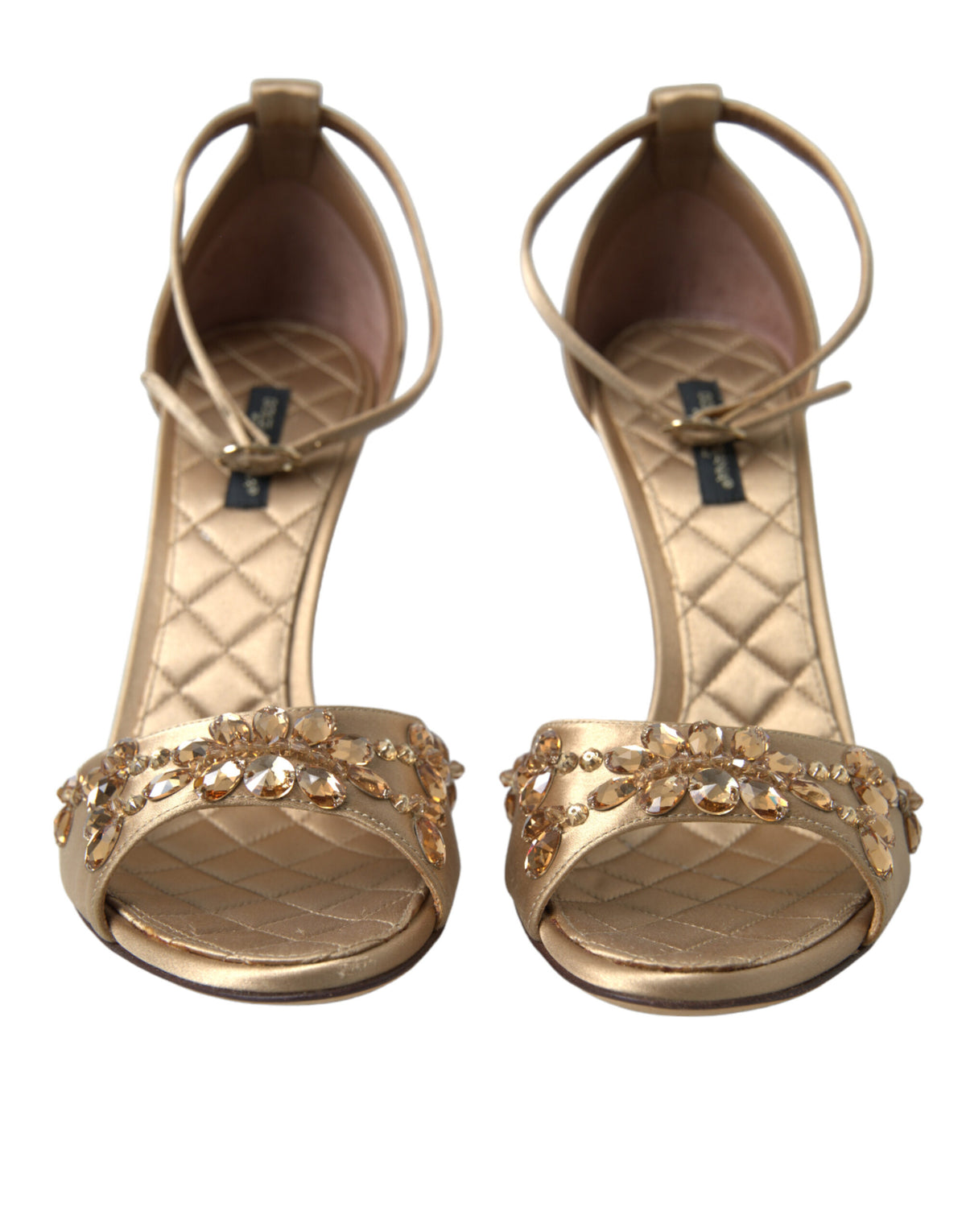 Experience the allure of Dolce & Gabbana's Gold Satin Ankle Strap Crystal Sandals, where exquisite craftsmanship meets timeless elegance, perfect for unforgettable moments.
