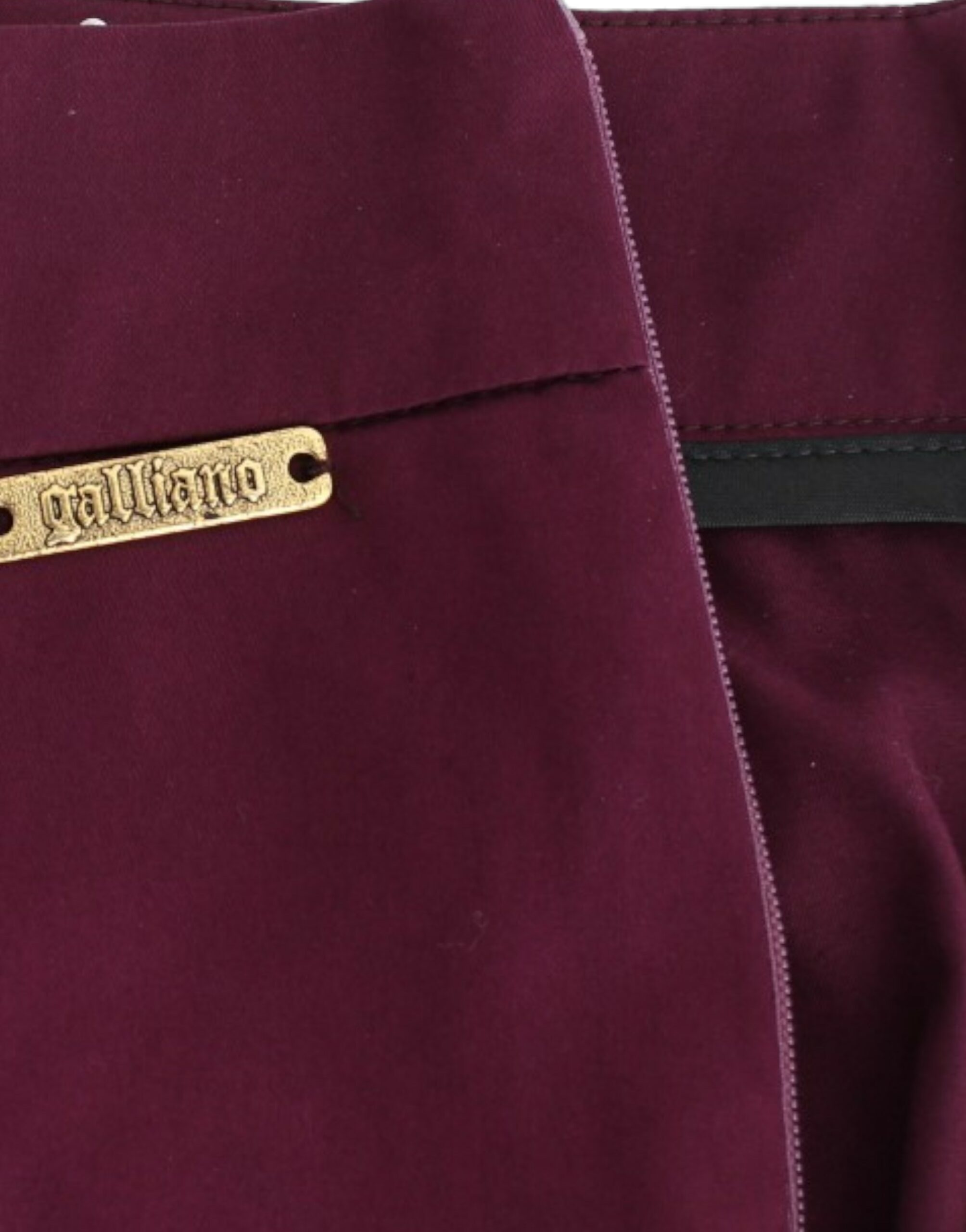 Elevate your wardrobe with John Galliano Purple Slim Fit Pants, a luxurious blend of 63% acetate and 34% nylon, embodying opulent elegance for the discerning fashionista.
