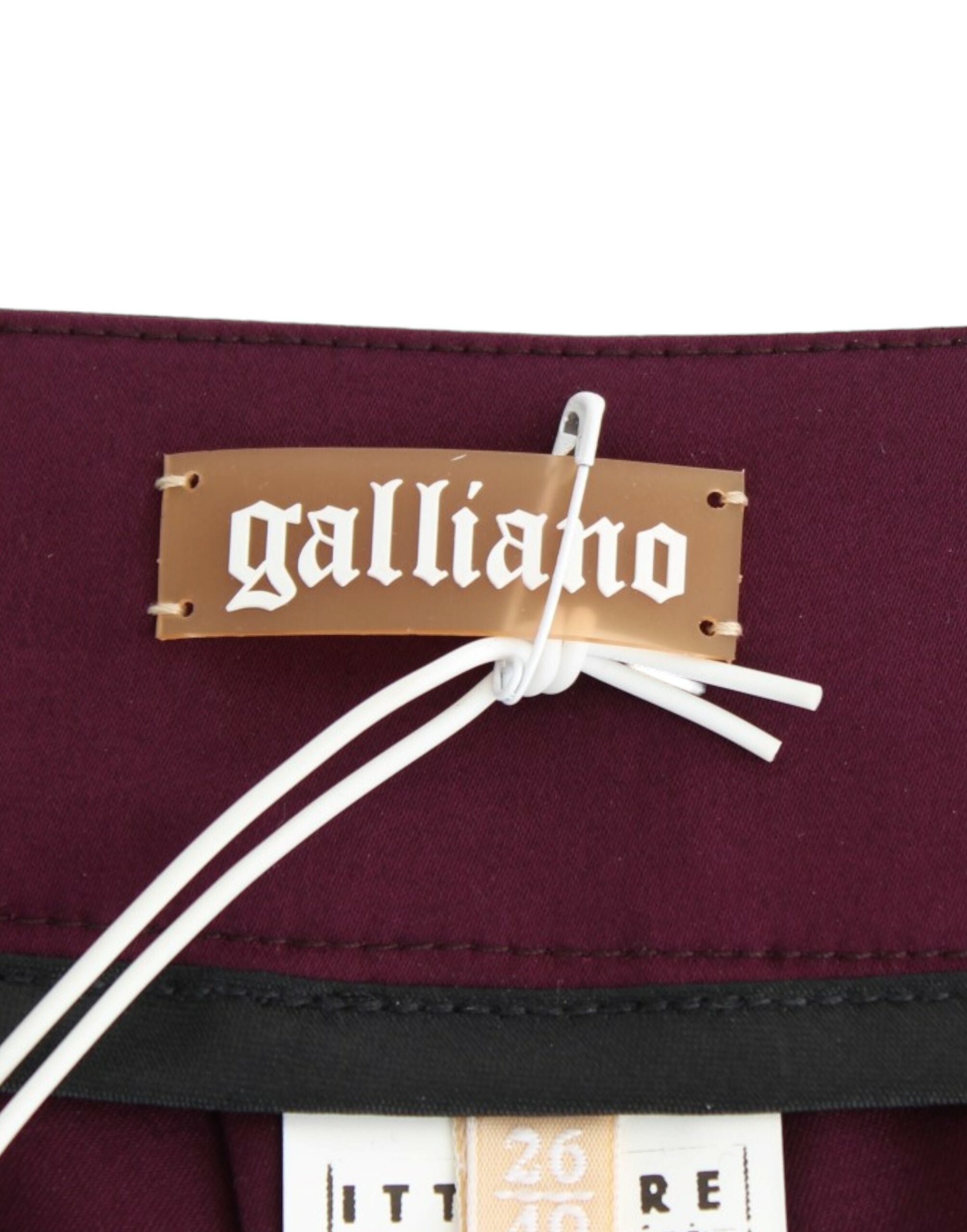 Elevate your wardrobe with John Galliano's Purple Slim Fit Pants, where opulent elegance meets exquisite craftsmanship in a luxurious blend of fabrics.