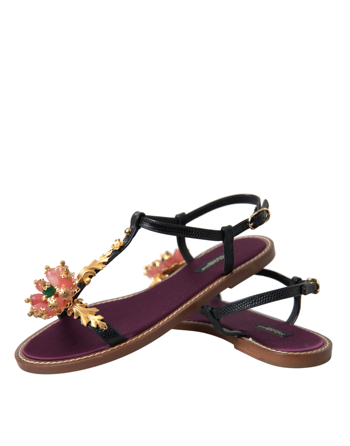 Indulge in the exquisite Dolce & Gabbana Black Crystal Gold Sandals, where 100% premium leather meets artisanal elegance, perfect for the discerning connoisseur.