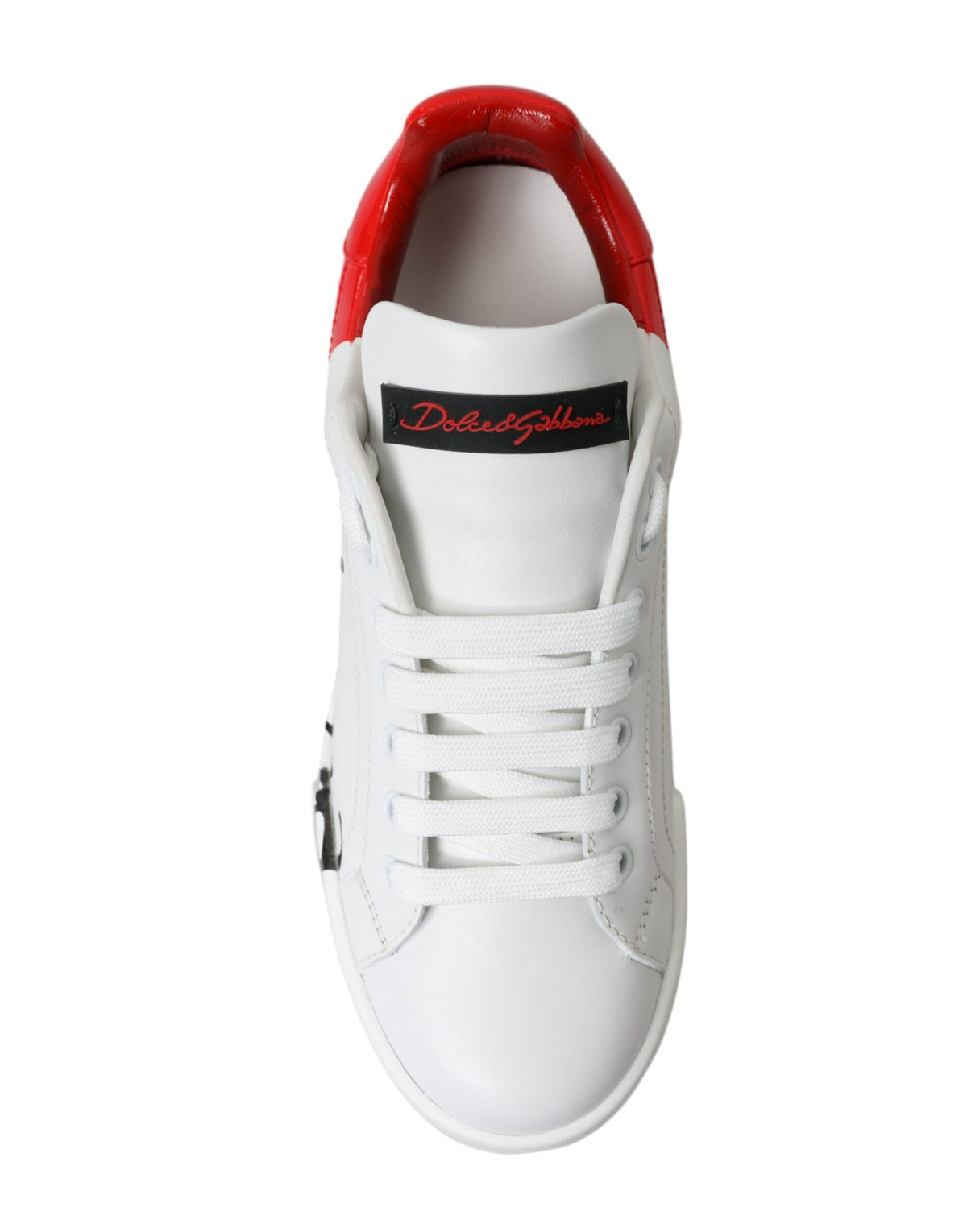 Step into the allure of Dolce & Gabbana with these exquisite white and red lace-up sneakers, crafted from luxurious leather in Italy, embodying elegance and sophistication.