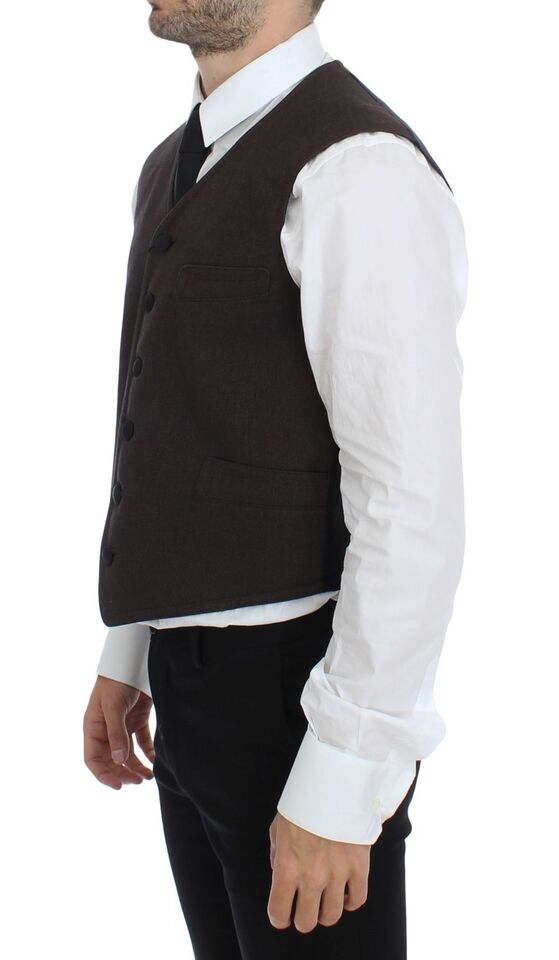 Indulge in the Dolce & Gabbana Brown Cotton Blend Dress Vest Gilet, a masterpiece of Italian craftsmanship that elevates sophistication and confidence for the discerning individual.