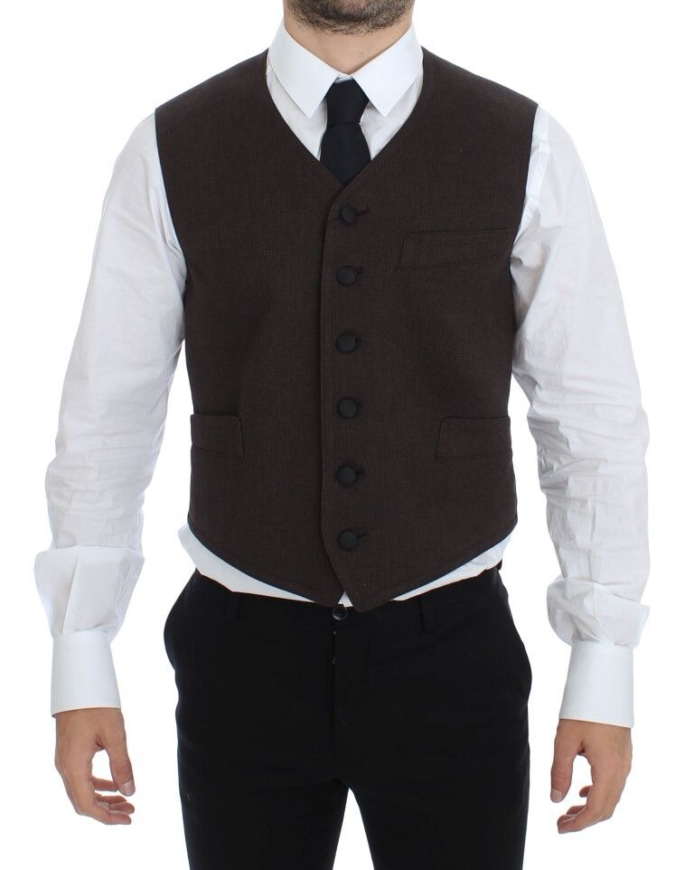 Indulge in the Dolce & Gabbana Brown Cotton Blend Dress Vest Gilet, a masterpiece of Italian craftsmanship that embodies elegance and sophistication for the discerning individual.