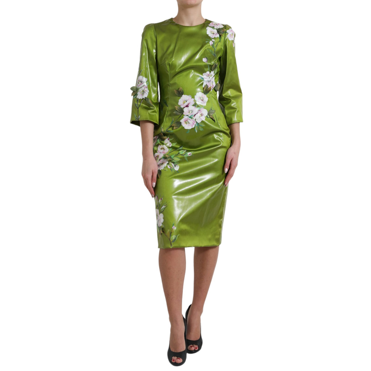 Indulge in the exquisite Dolce & Gabbana Green Floral Embellished Sheath Midi Dress, a masterpiece of silk and artistry, designed for those who embody elegance and sophistication.