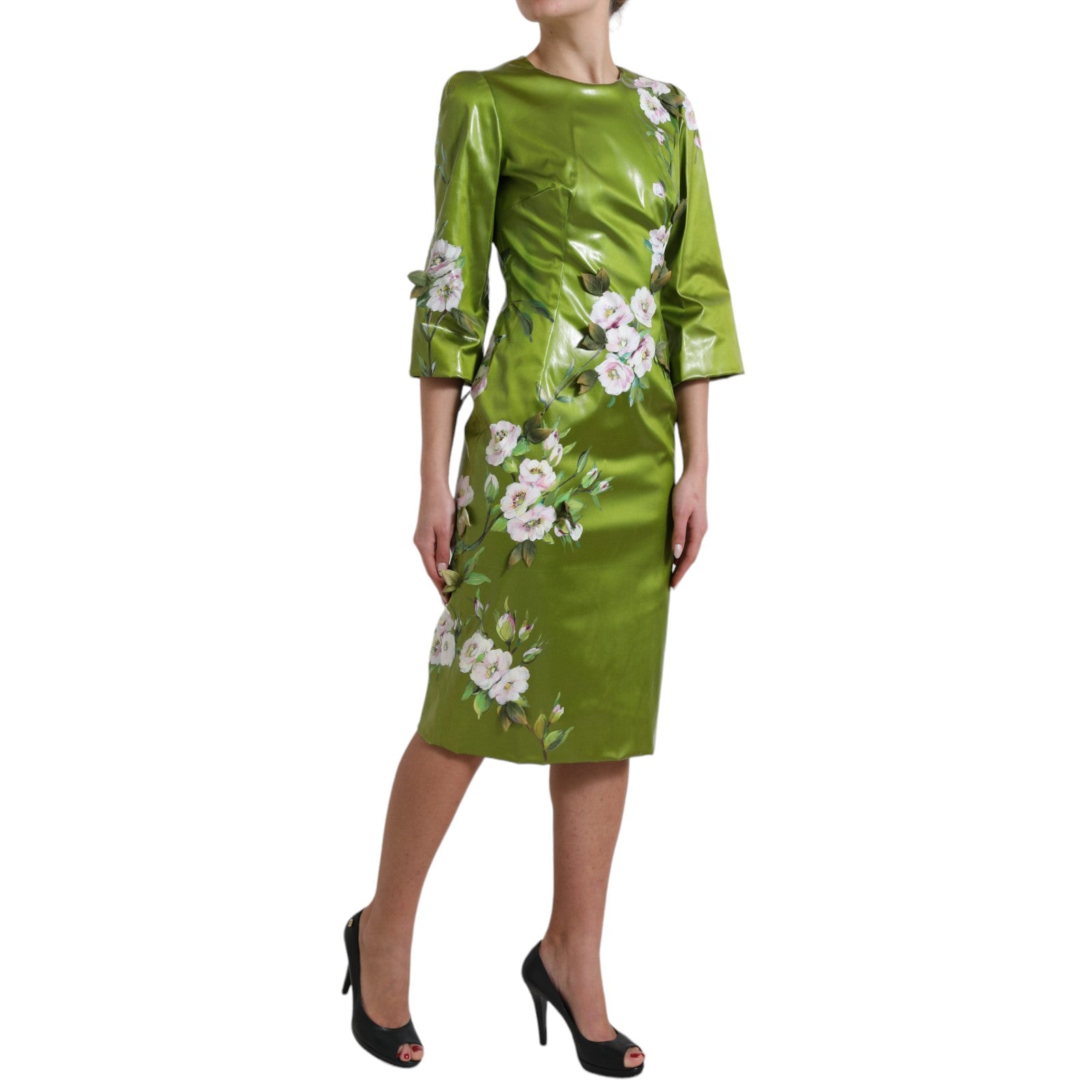 Experience the exquisite Dolce & Gabbana Green Floral Embellished Sheath Midi Dress, where luxurious silk and masterful craftsmanship redefine elegance for the discerning individual.