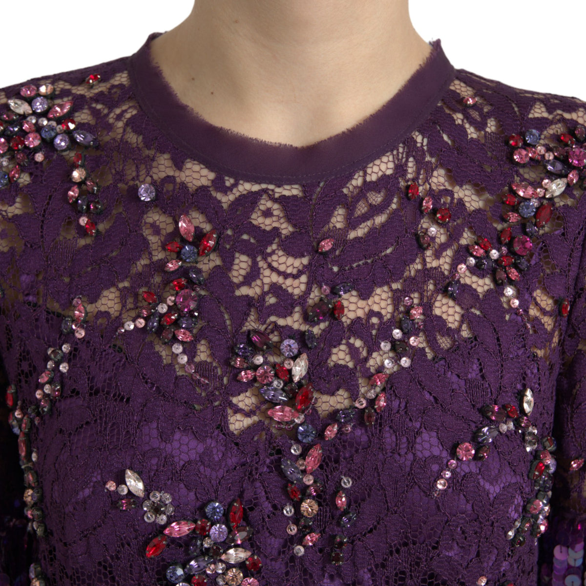 Elevate your elegance with the Dolce & Gabbana Purple Floral Lace Crystal Embedded Dress, a masterpiece of Italian craftsmanship, embodying luxury and allure for the discerning individual.