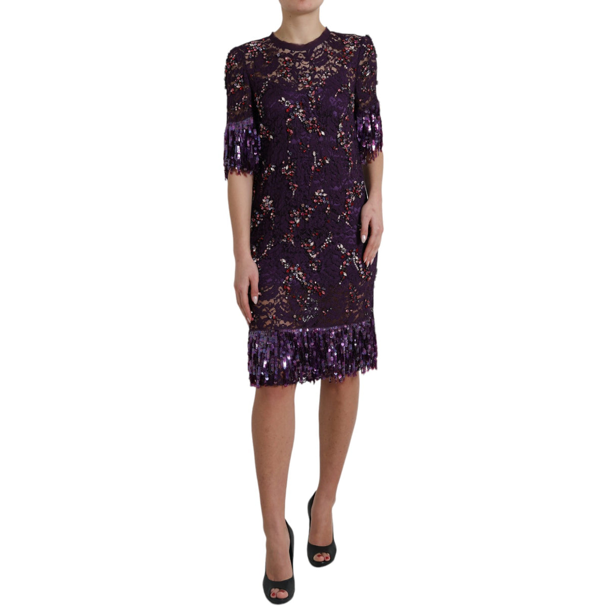 Elevate your wardrobe with the Dolce & Gabbana Purple Floral Lace Crystal Embedded Dress, a masterpiece of Italian craftsmanship that embodies sophistication and allure.