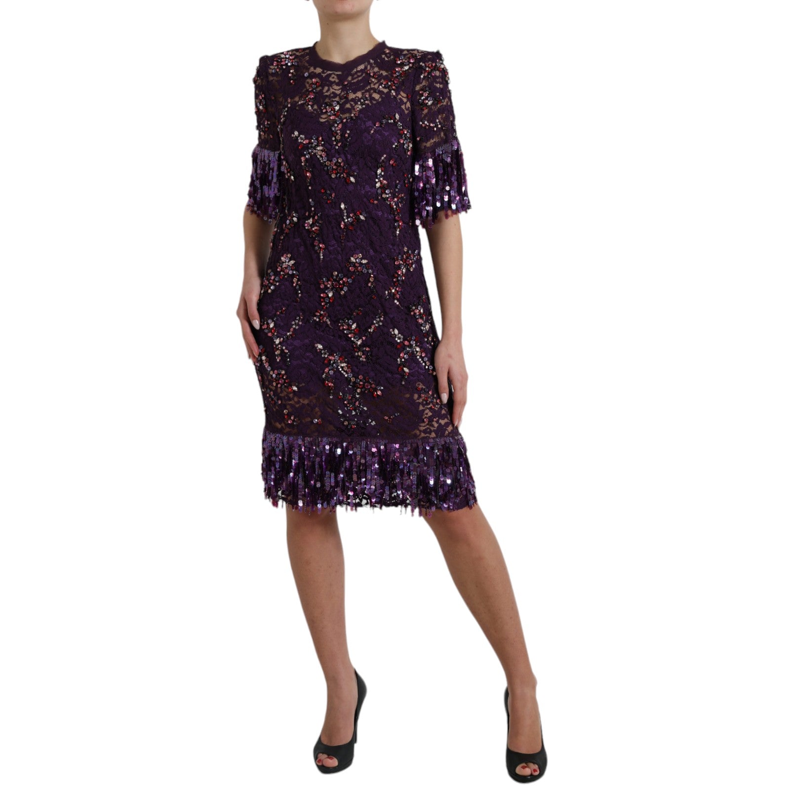 Elevate your wardrobe with the Dolce & Gabbana Purple Floral Lace Crystal Embedded Dress, a masterpiece of Italian craftsmanship that embodies elegance and allure.